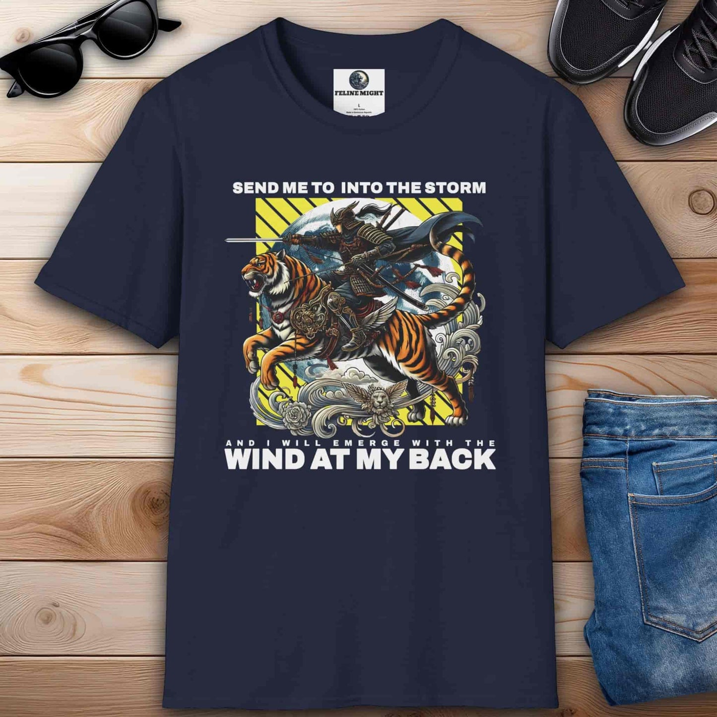 Navy blue t-shirt with a warrior riding a tiger and the phrase "Send me into the storm and I will emerge with the wind at my back", inspired by adventure and courage.