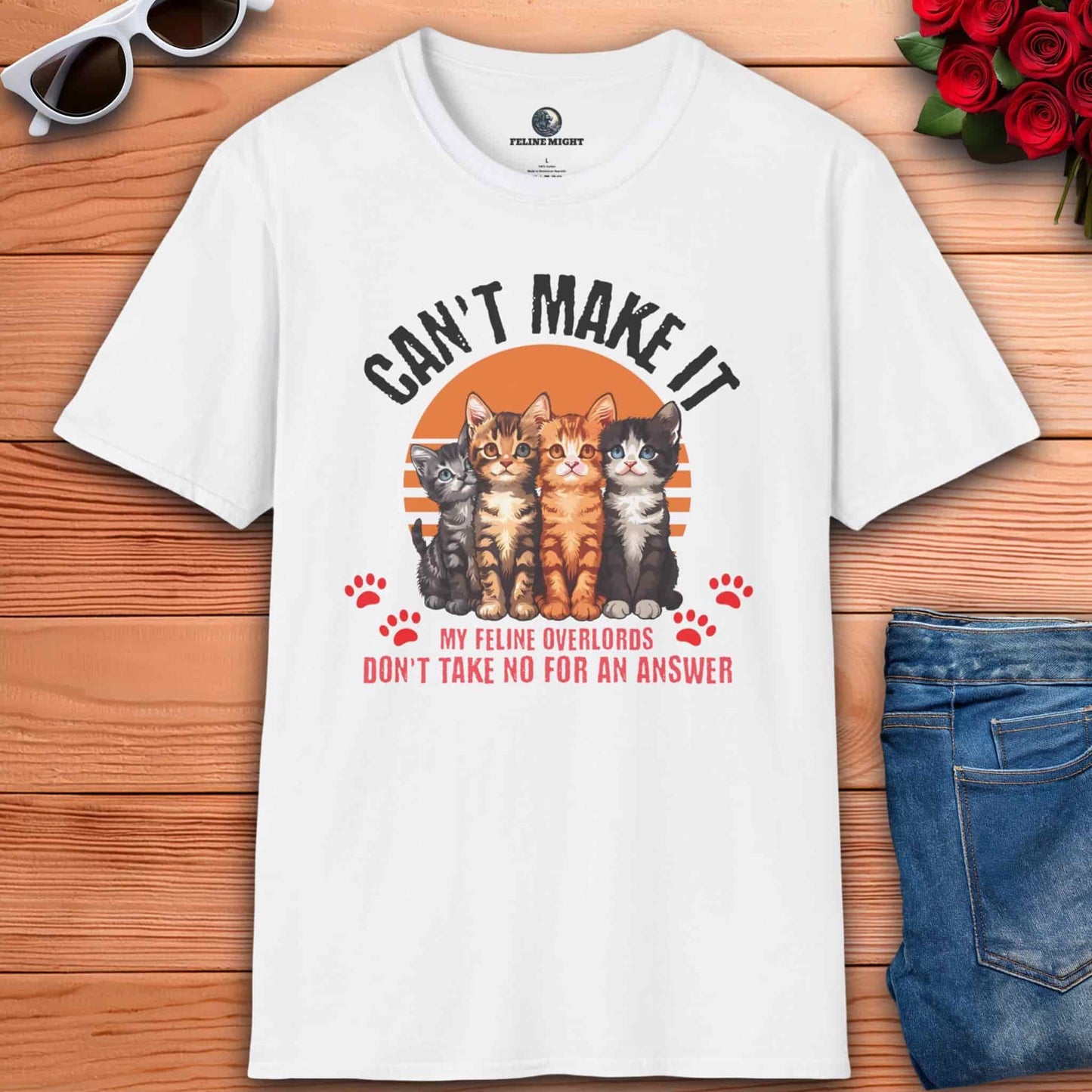 Humorous white t-shirt featuring cats and the phrase 'My Feline Overlords don't take no for an answer', ideal for cat enthusiasts who enjoy playful style in their outfits.