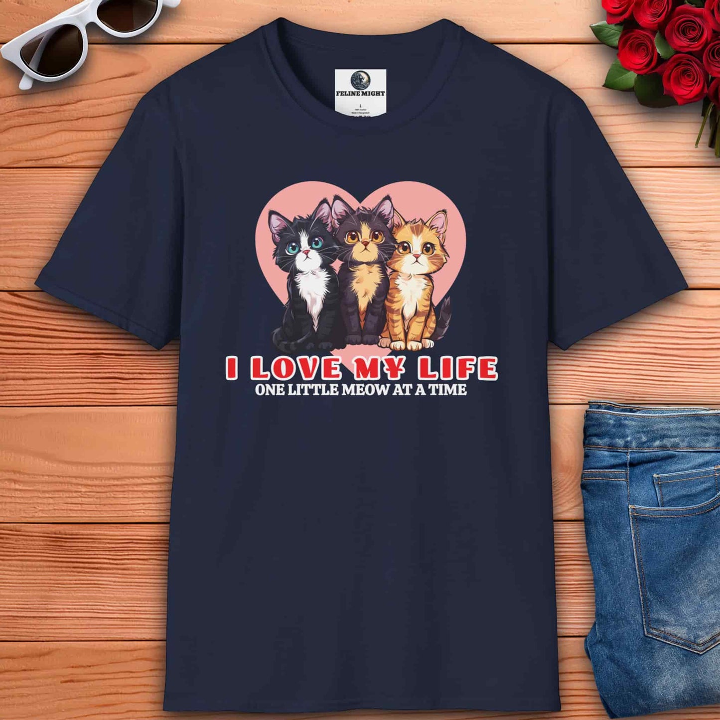 Navy blue t-shirt featuring three cute cats and the phrase 'I Love My Life, One Little Meow at a Time' with a heart background.