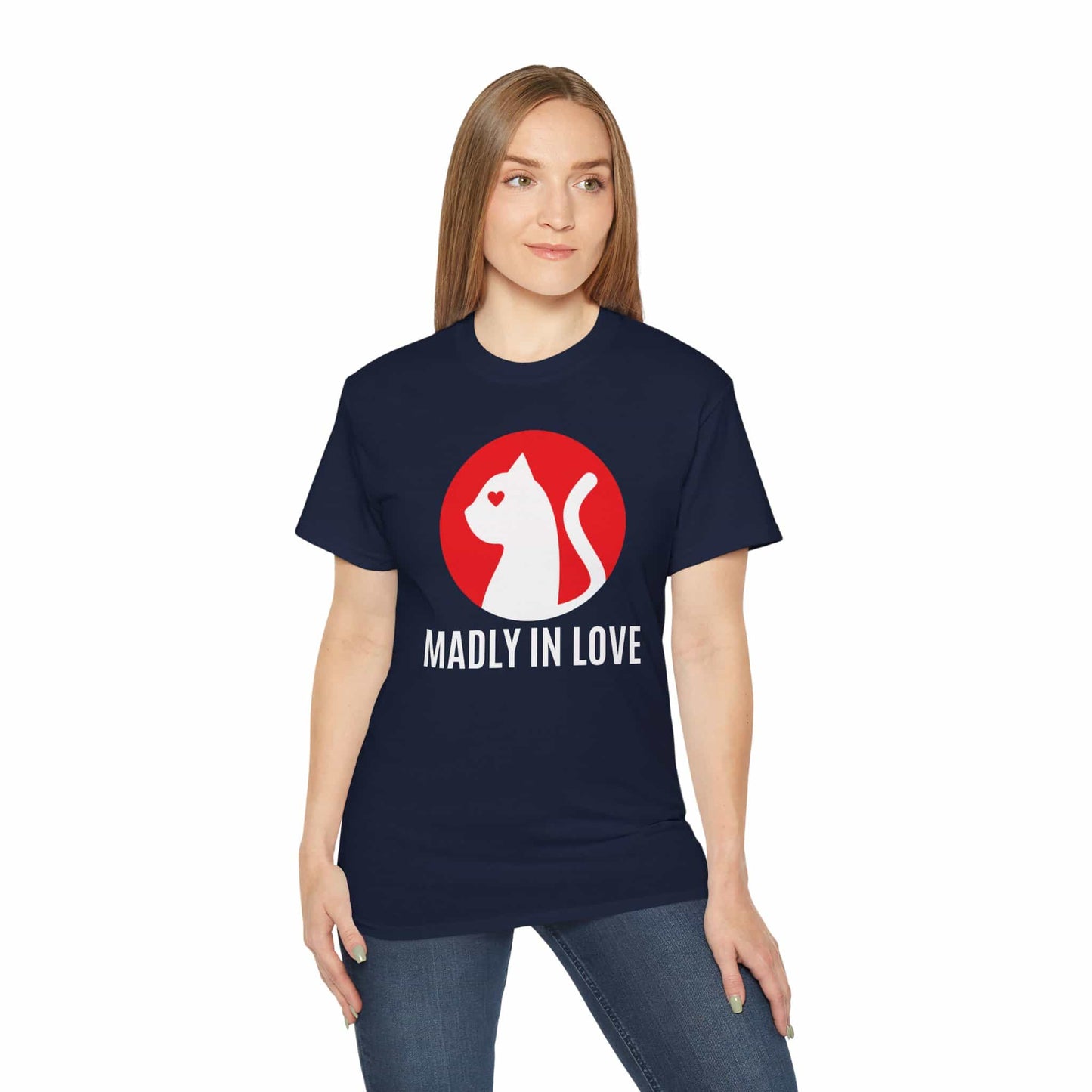 A woman wearing a navy blue Madly in Love Cat T-Shirt featuring a cat silhouette on a red circle, a perfect romantic gift for cat lovers.