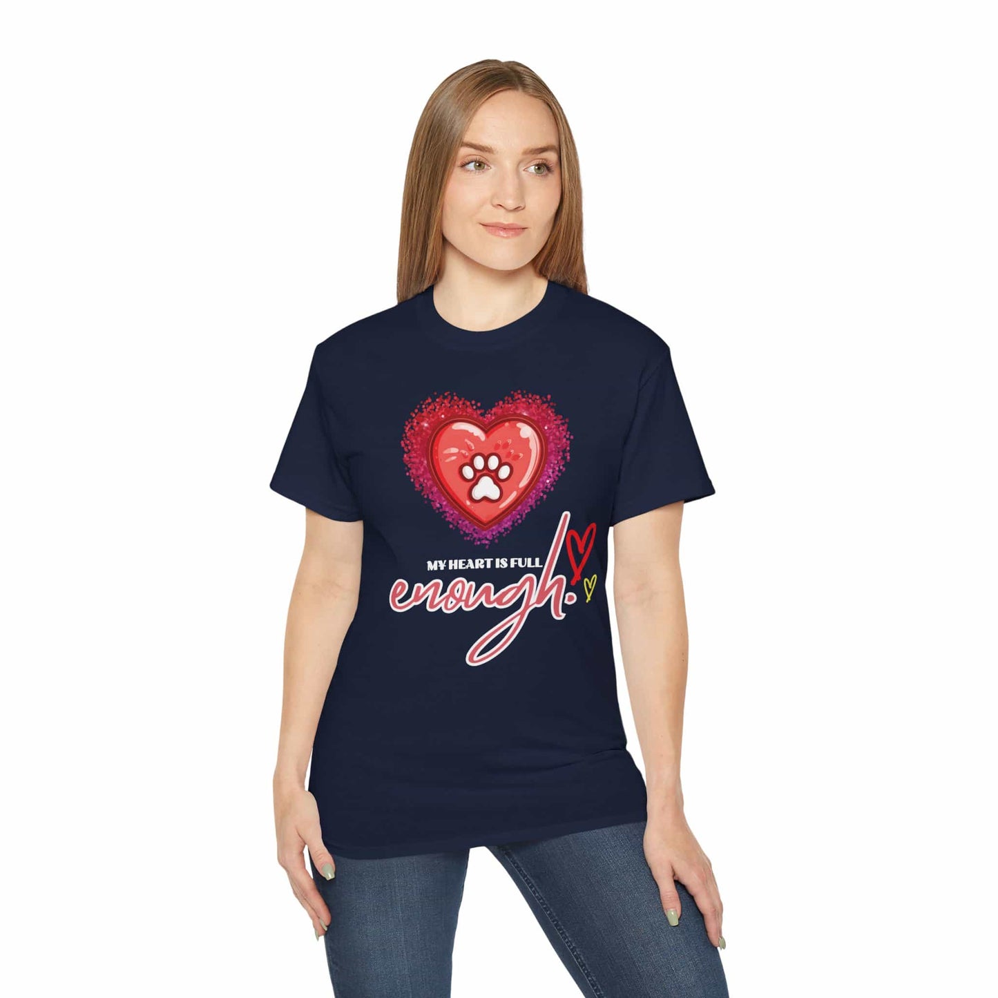A woman wearing a navy blue My Heart is Full Cat T-shirt with a heart and paw print design on a white background.