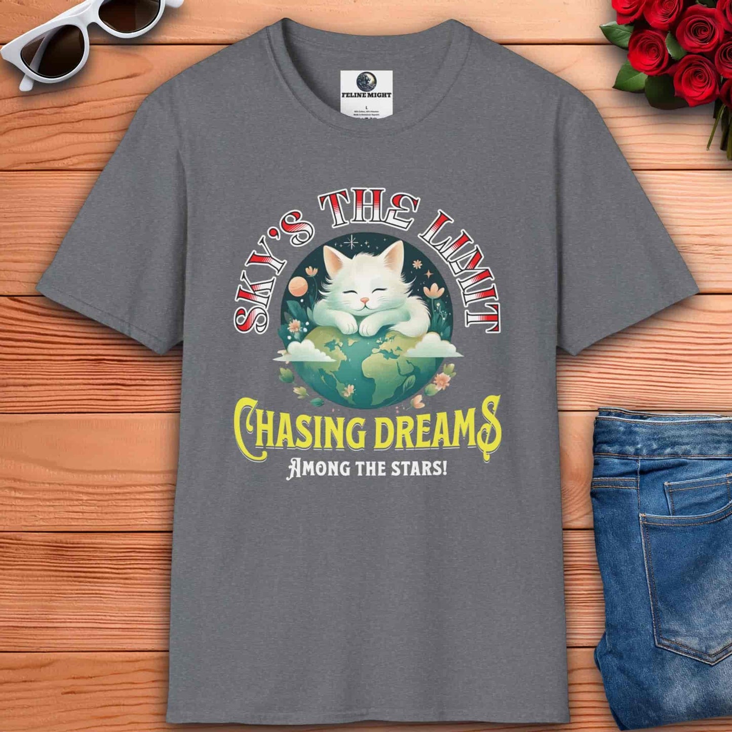 An athletic heather grey T-shirt with the bold statement "Sky's the Limit, Chasing Dreams Among the Stars" reflects a fierce attitude toward pursuing aspirations.