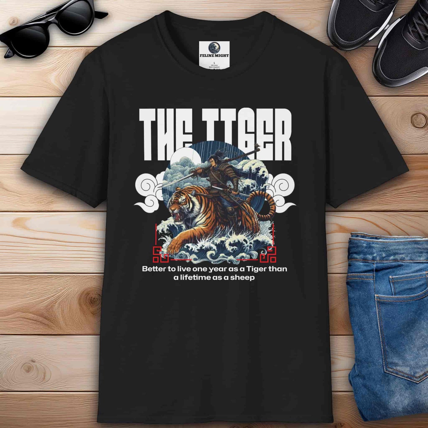 Black t-shirt featuring a tiger and a warrior with the quote 'Better to live one year as a Tiger than a lifetime as a sheep.'
