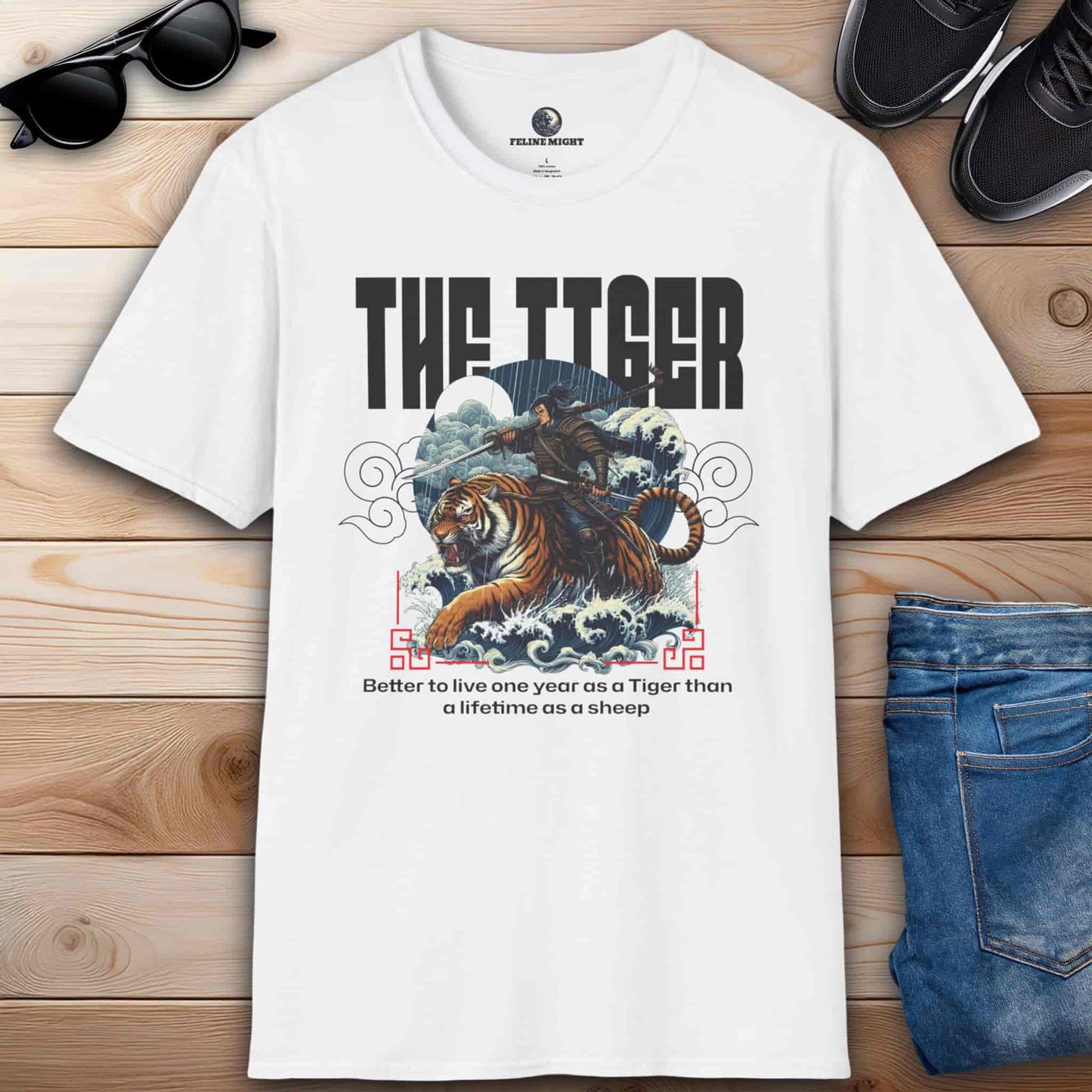 White t-shirt featuring a tiger and a warrior with the quote 'Better to live one year as a Tiger than a lifetime as a sheep.'