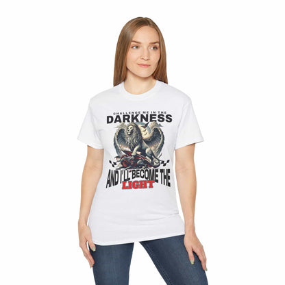 A woman wearing a white Challenge Me in the Darkness Lion T-Shirt featuring a majestic winged lion graphic.