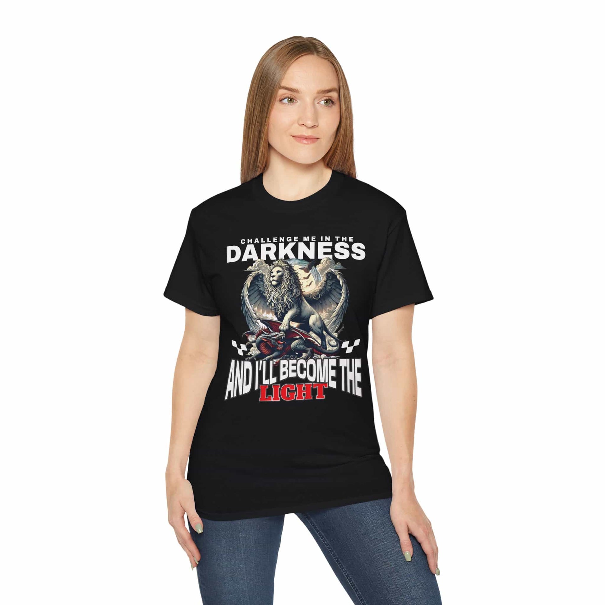 A woman wearing a black Challenge Me in the Darkness Lion T-Shirt featuring a majestic winged lion graphic.