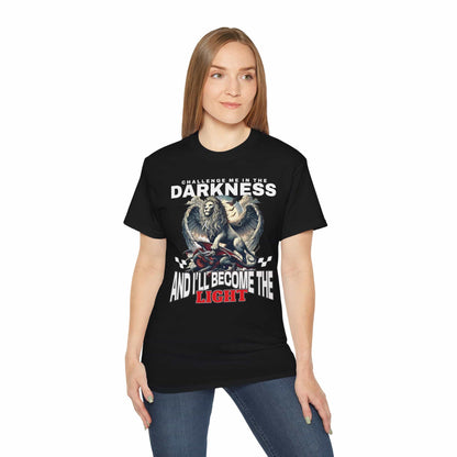 A woman wearing a black Challenge Me in the Darkness Lion T-Shirt featuring a majestic winged lion graphic.