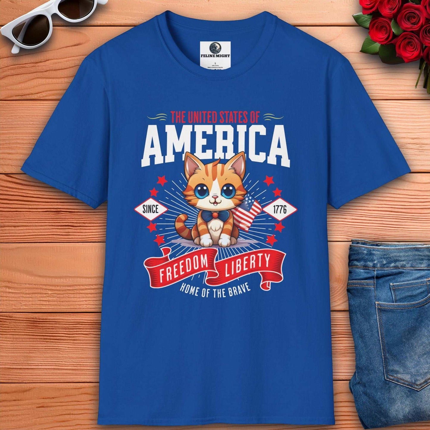 Cute American kitten royal blue t-shirt design featuring the text 'Freedom Liberty' and stars