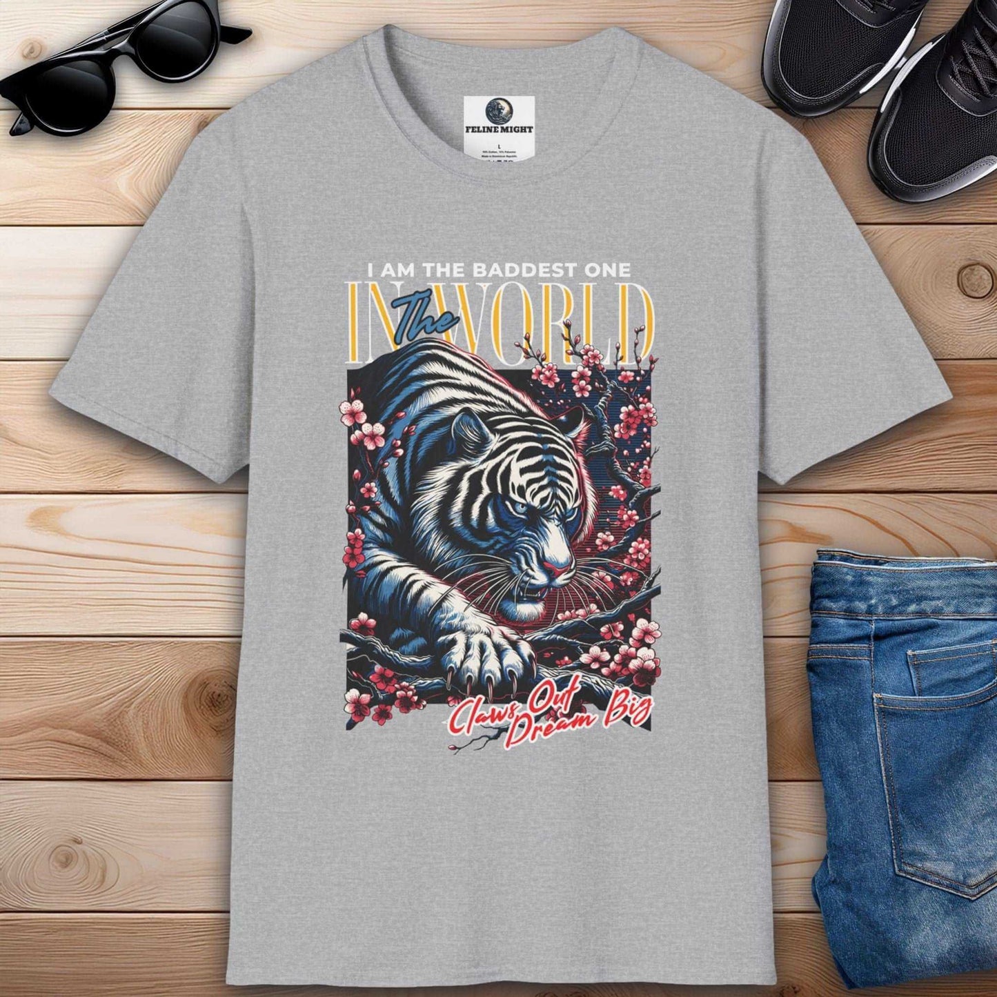 Grey t-shirt featuring a fierce tiger design with the text 'I AM THE BADDEST ONE IN THE WORLD'