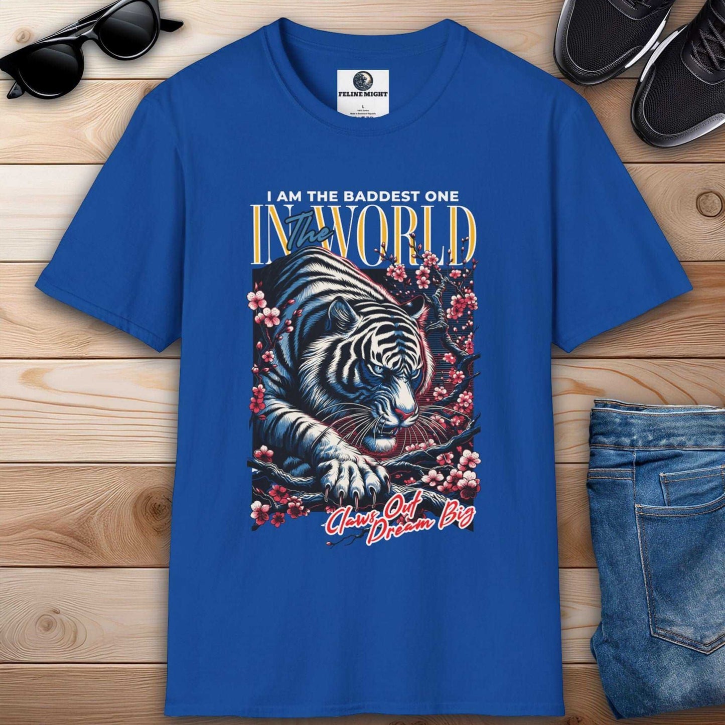 Royal blue t-shirt featuring a fierce tiger design with the text 'I AM THE BADDEST ONE IN THE WORLD'