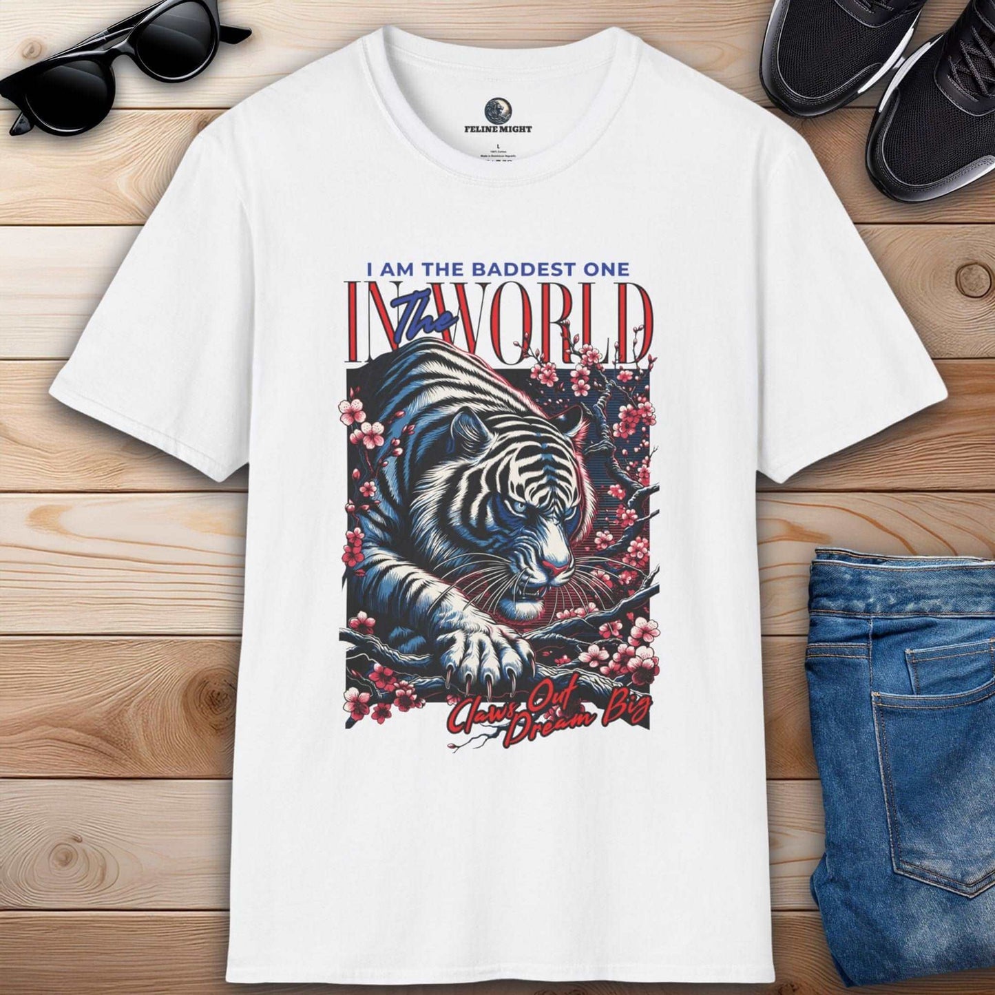 White t-shirt featuring a fierce tiger design with the text 'I AM THE BADDEST ONE IN THE WORLD'