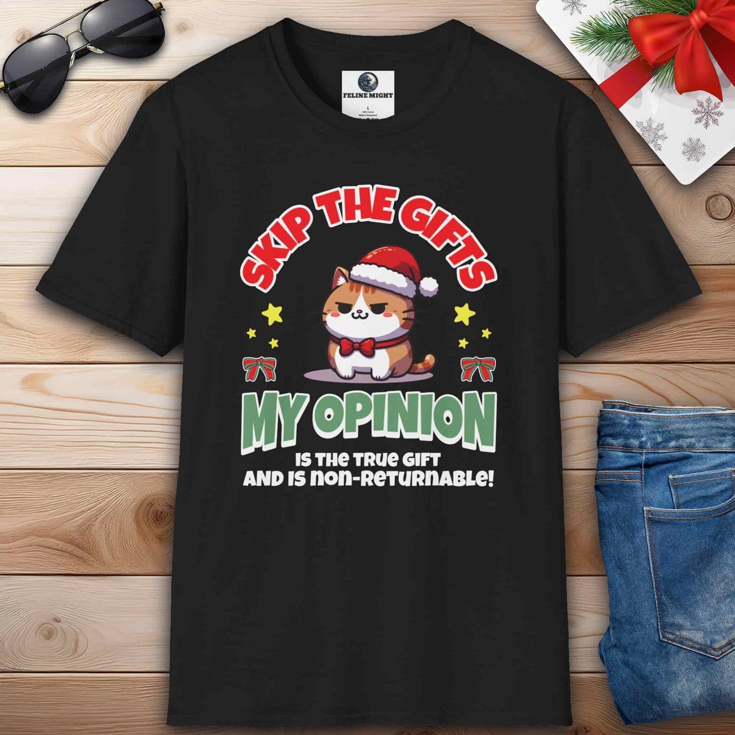 A black Cat Christmas Humor T-Shirt featuring a sarcastic cat design and the phrase 'My Opinion is the True Gift and is Non-Returnable!'