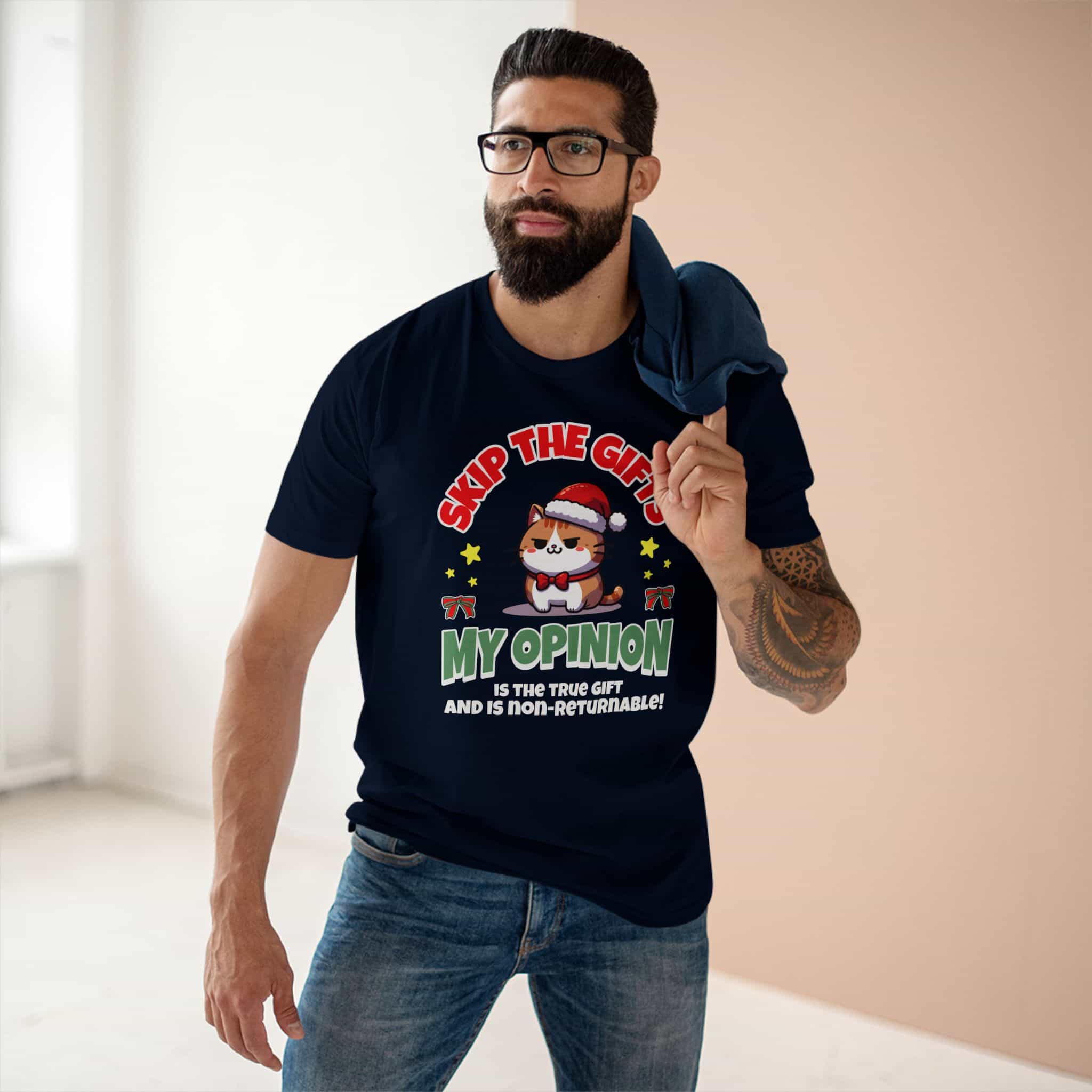 A navy blue Skip The Gifts Cat T-Shirt worn by a man, featuring a sarcastic cat design and the phrase 'My Opinion is the True Gift and is Non-Returnable!'