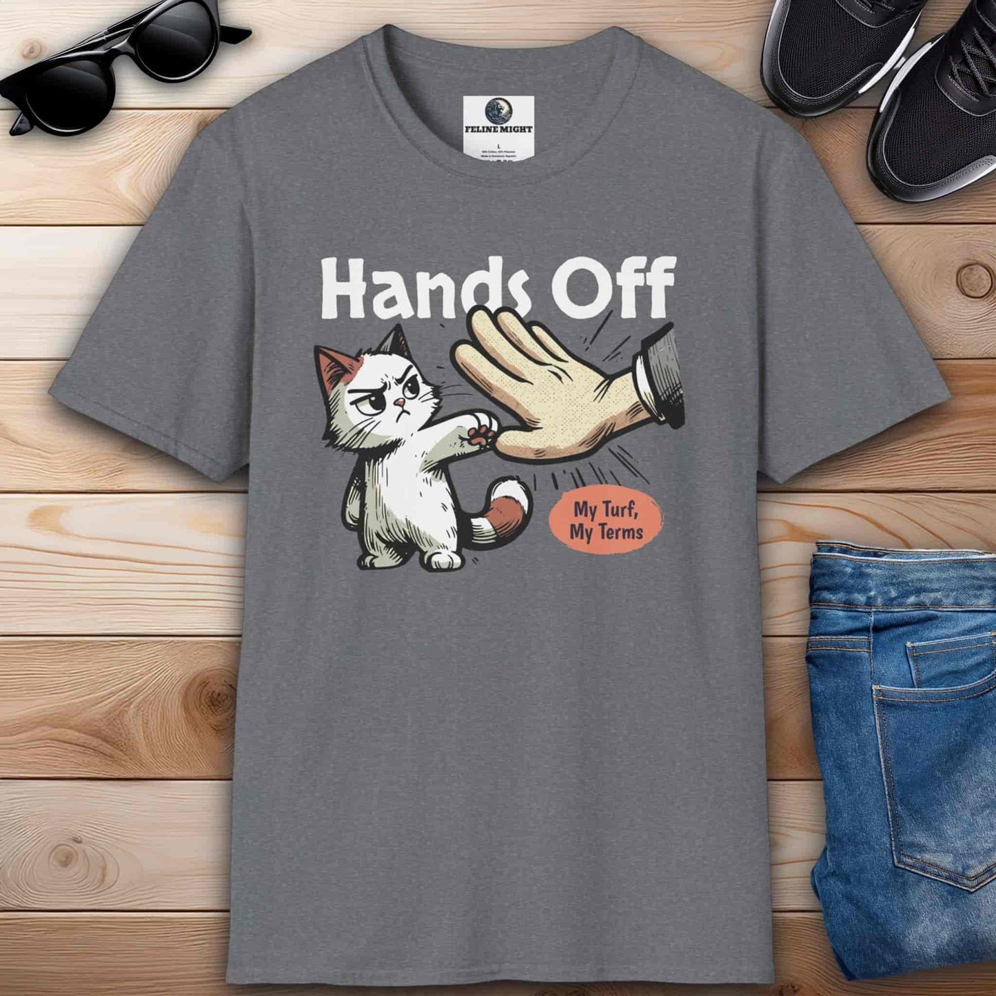 Athletic heather grey  graphic t-shirt featuring a cat and the phrase “Hands off, my turf, my terms,” ideal for expressing confidence and humor.