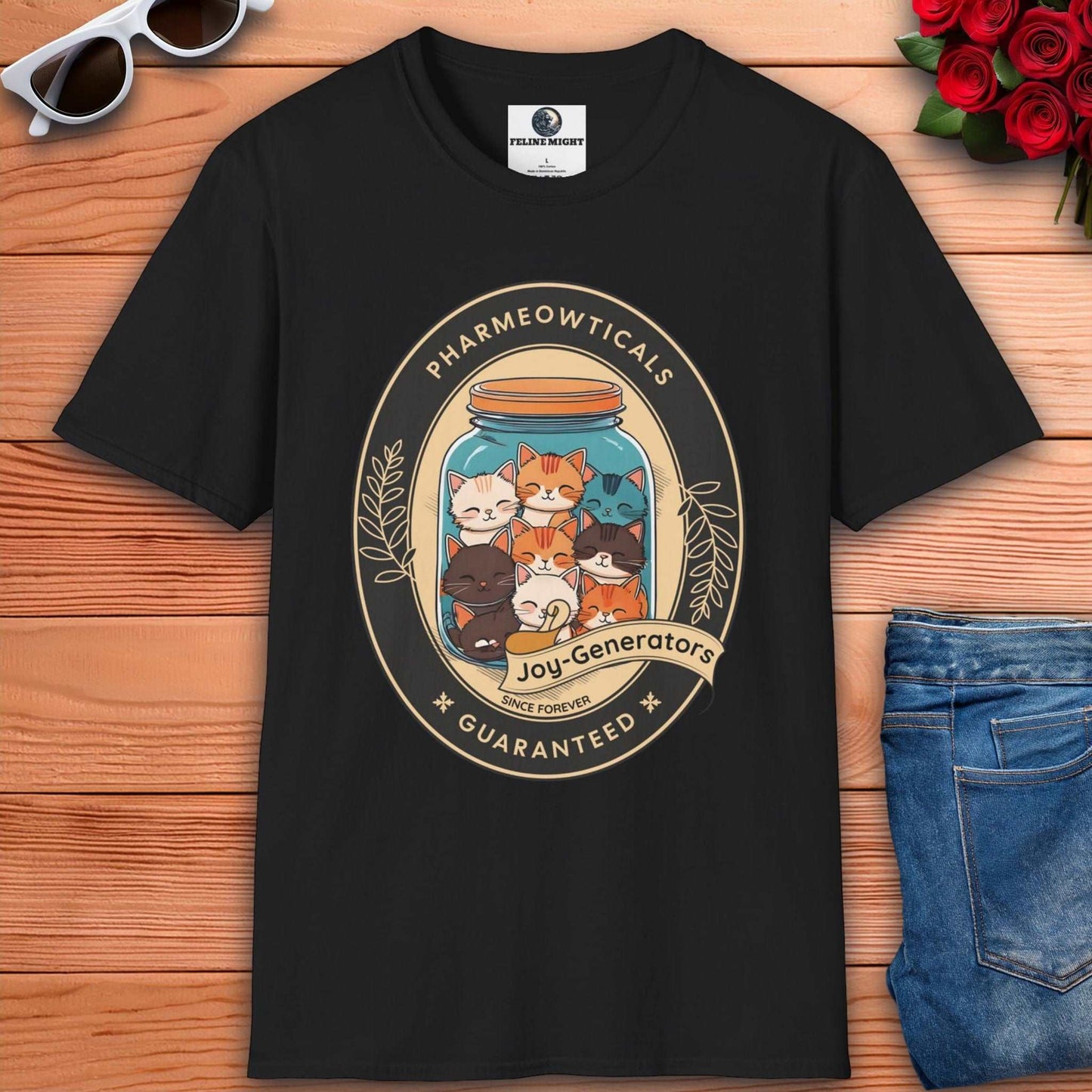 Black t-shirt featuring a cute cat design with the text 'Pharmeowticals Joy-Generators'