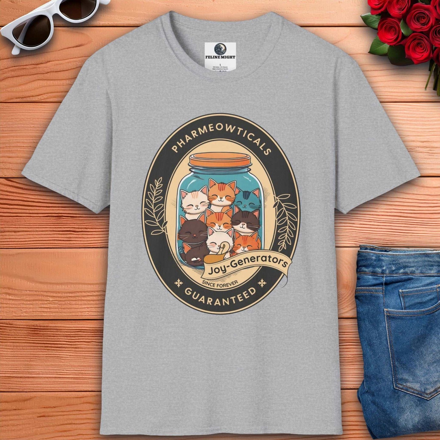 Grey t-shirt featuring a cute cat design with the text 'Pharmeowticals Joy-Generators'