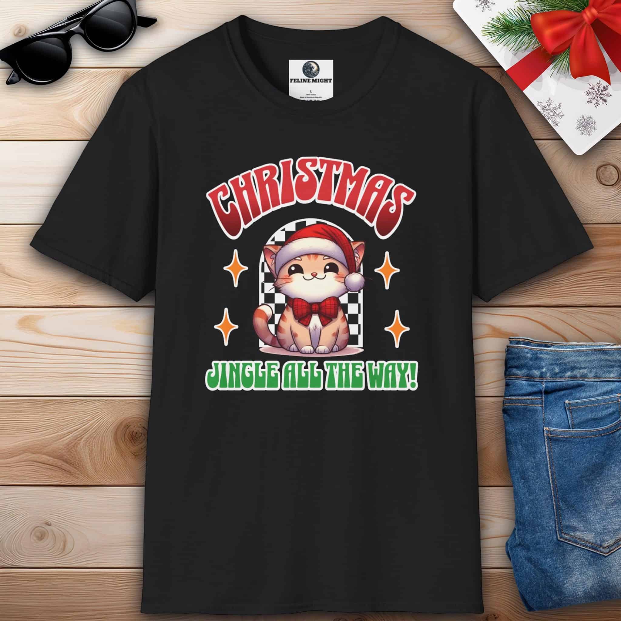 A black Jingle All The Way Cat T-Shirt featuring a cat with a Santa hat, perfect for cat lovers celebrating the holiday spirit.