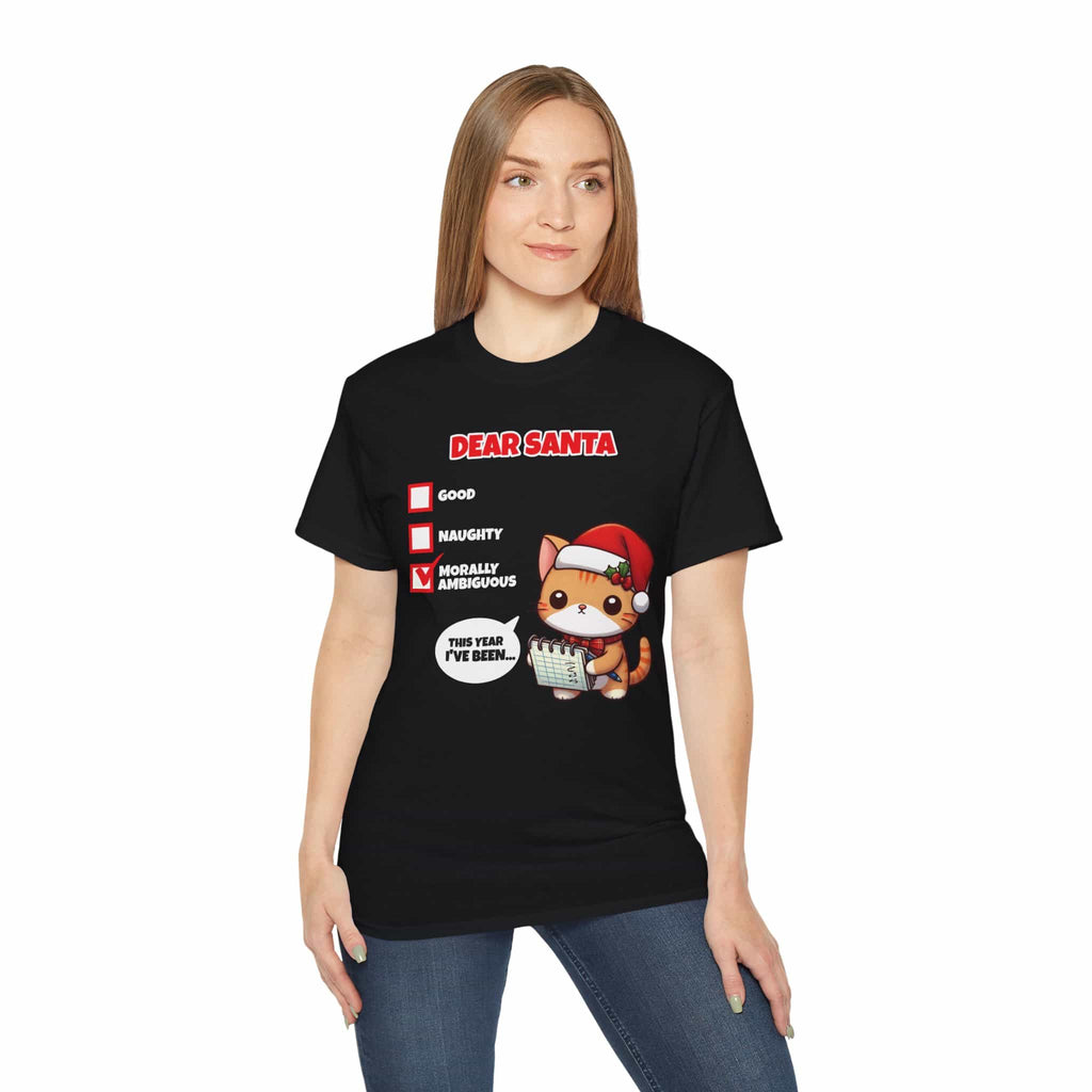 A woman wearing a black Dear Santa Cat T-Shirt featuring a cute cat illustration and festive humor.