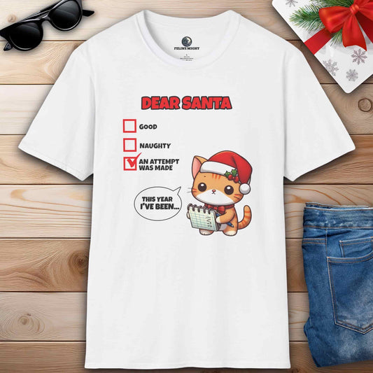 A humorous white t-shirt showcasing a cat wearing a Santa hat, accompanied by the phrase Dear Santa, perfect for cat lovers.