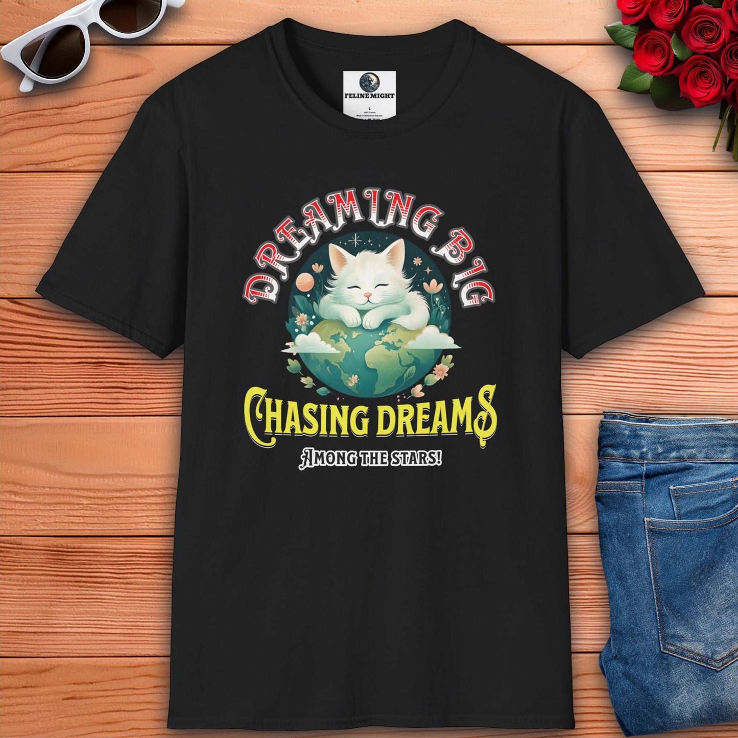 Black t-shirt with a cute cat design featuring the phrase 'Dreaming Big Chasing Dreams Among the Stars'