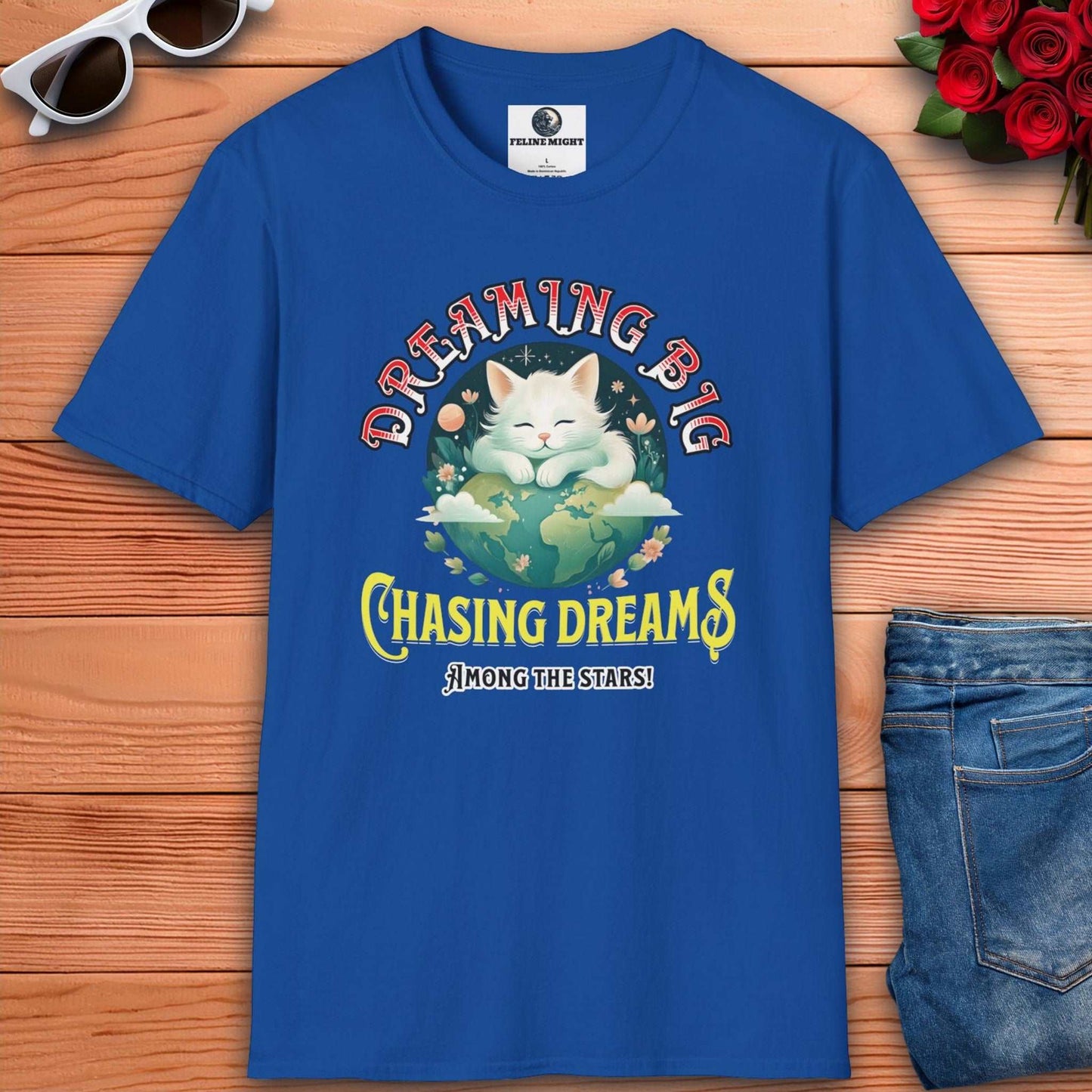 Royal blue t-shirt with a cute cat design featuring the phrase 'Dreaming Big Chasing Dreams Among the Stars'