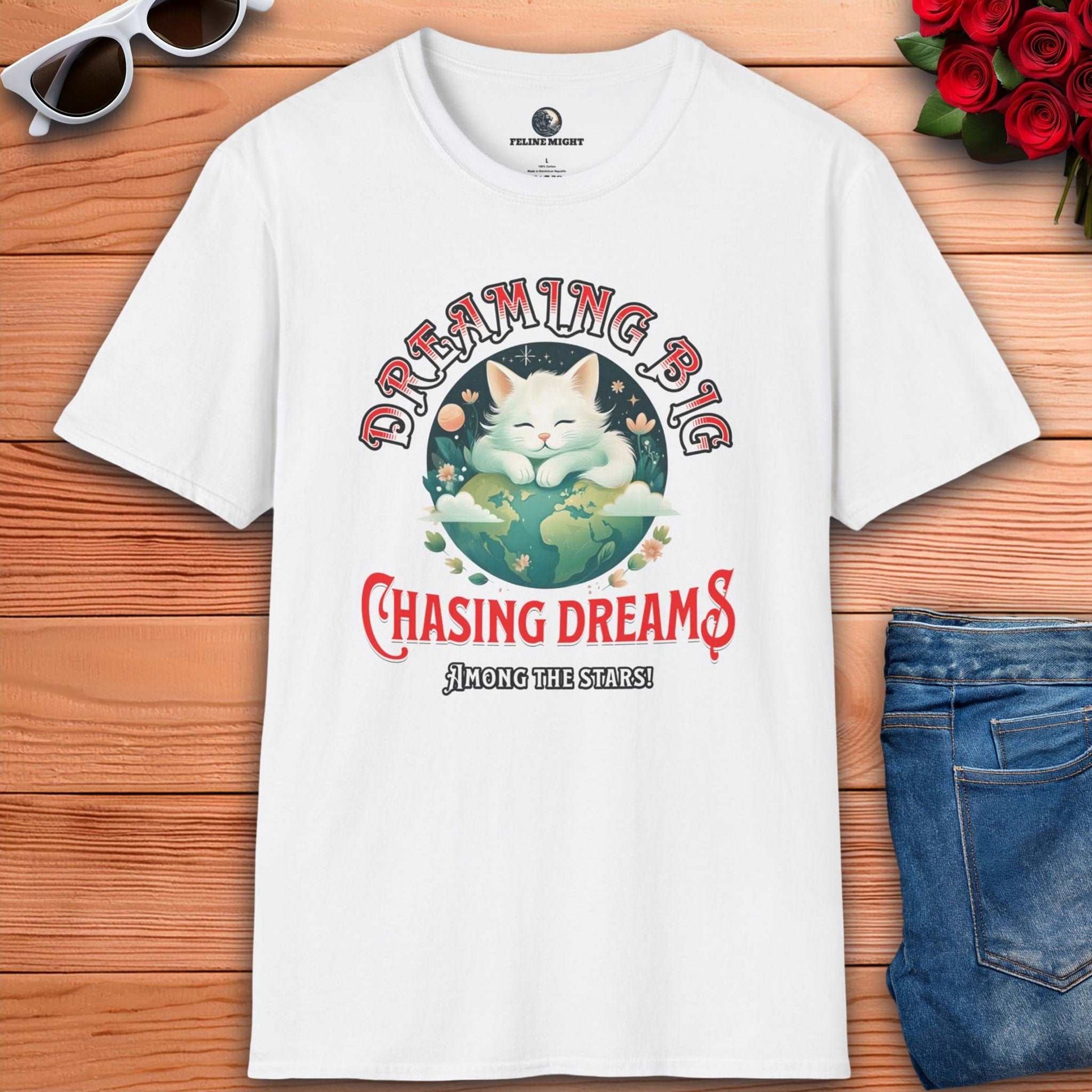 White t-shirt with a cute cat design featuring the phrase 'Dreaming Big Chasing Dreams Among the Stars'