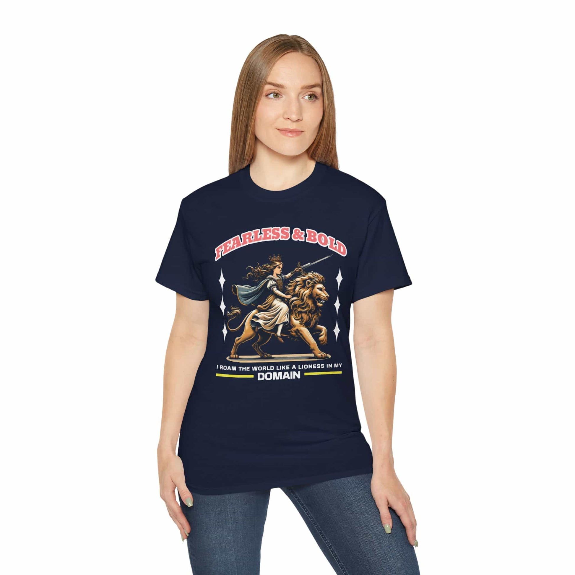 A woman in a navy blue Fearless Lioness Warrior T-Shirt featuring a sword-wielding queen and lion design.