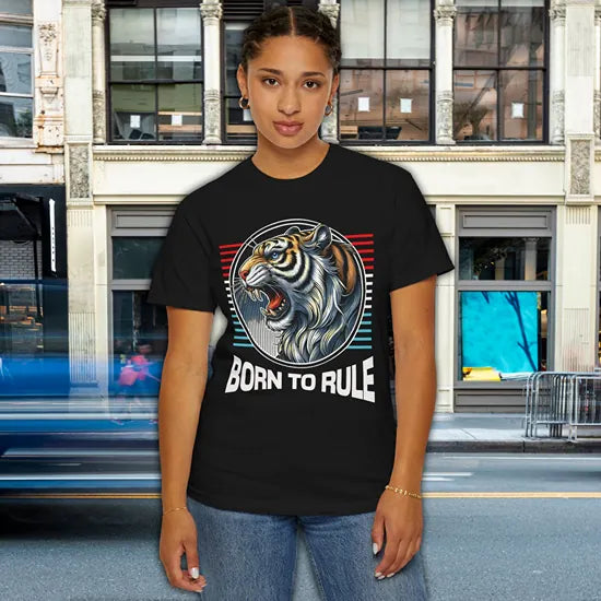 Female model wearing a Feline Might black T-shirt featuring a roaring tiger design and the phrase Born to Rule.