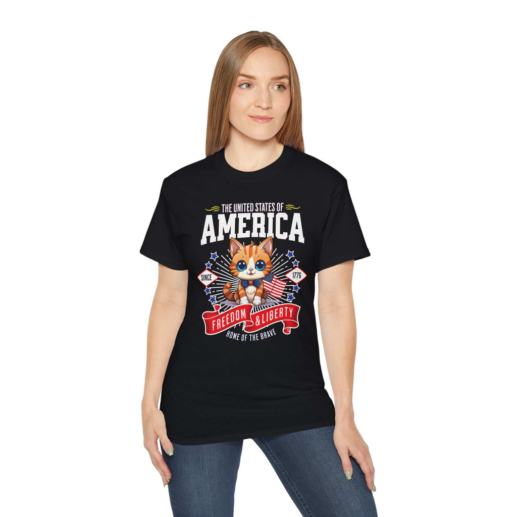A woman in a black Pawtriotic America T-Shirt, featuring a cute kitten with American flag elements, perfect for patriotic cat lovers.