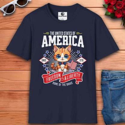A navy blue Freedom and Liberty Cat T-Shirt featuring a cute kitten with American flag elements, perfect for patriotic cat lovers.