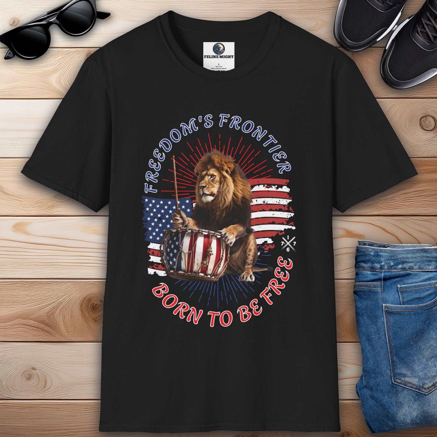 Black t-shirt featuring a lion playing a drum with American flag design