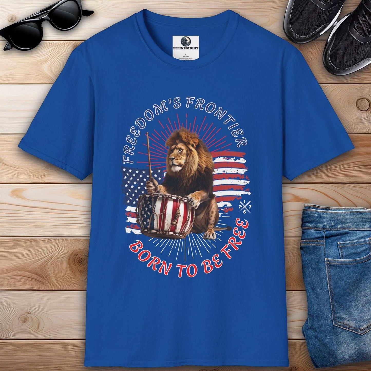 Royal blue t-shirt featuring a lion playing a drum with American flag design