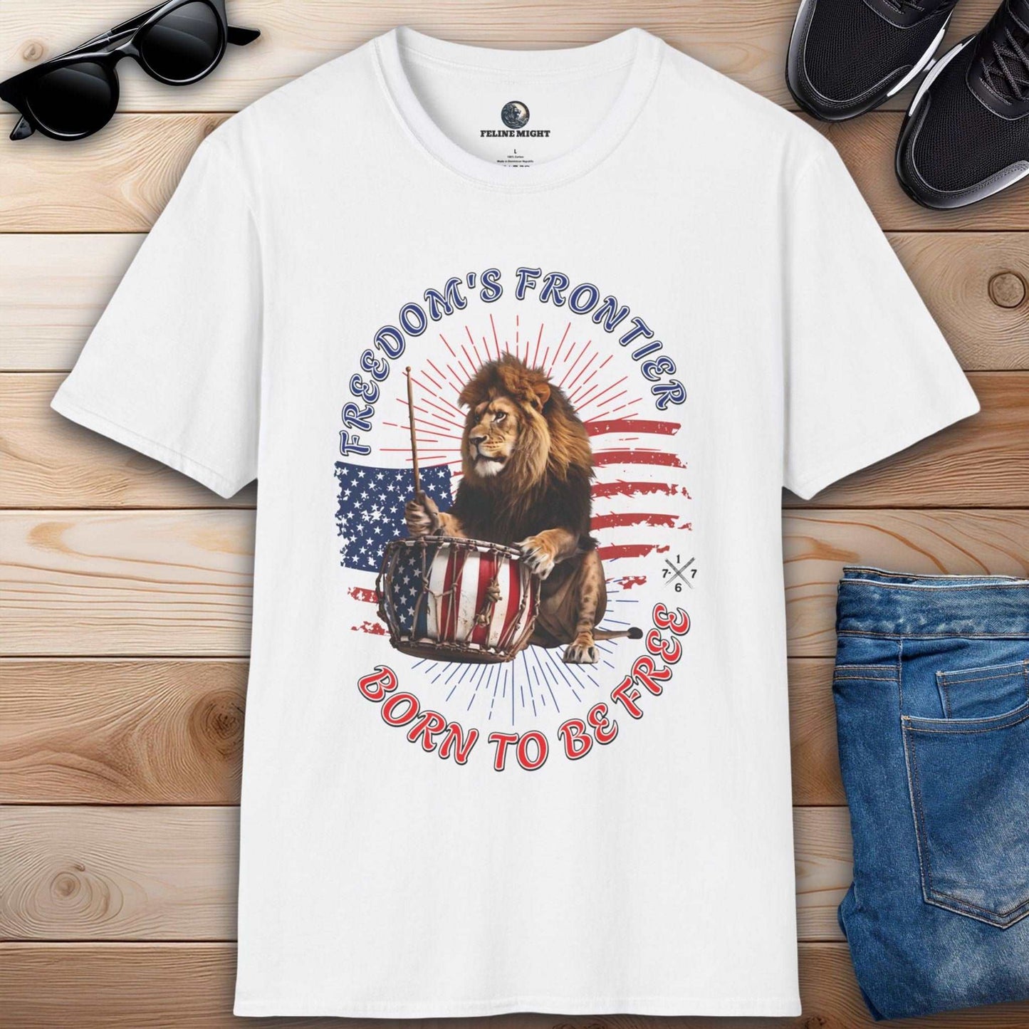 White t-shirt featuring a lion playing a drum with American flag design