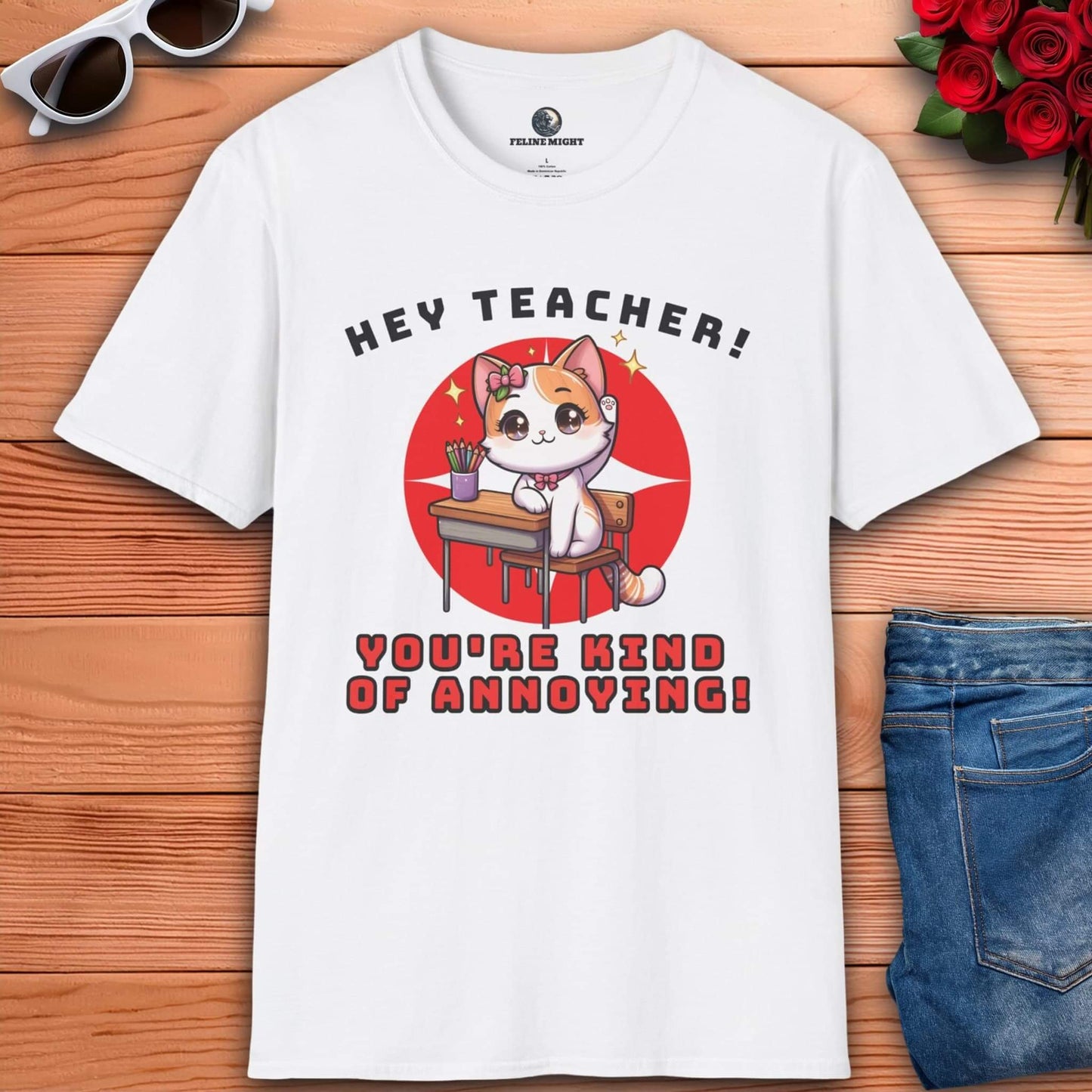 A cute cat character on a white t-shirt saying 'Hey Teacher! You're Kind of Annoying!'