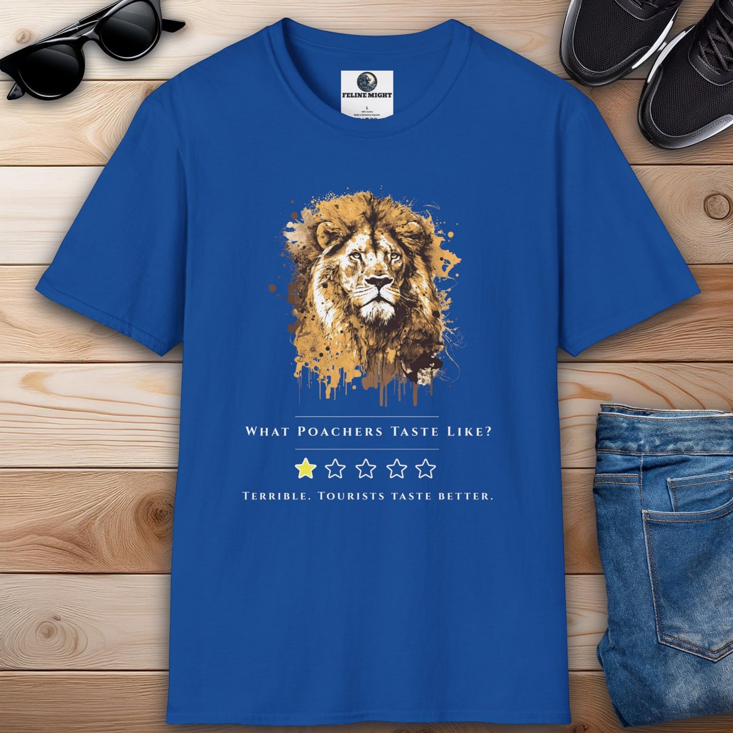 A stylish royal blue t-shirt with a lion illustration and the text 'What Poachers Taste Like?'