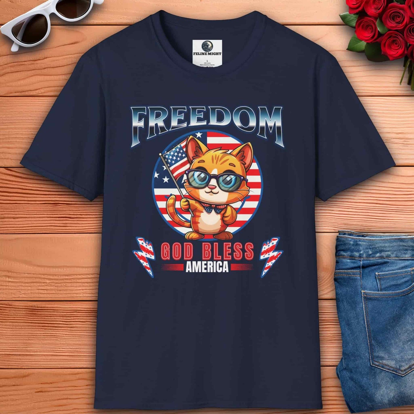 Cute cat wearing glasses on a navy blue t-shirt with 'Freedom God Bless America' design