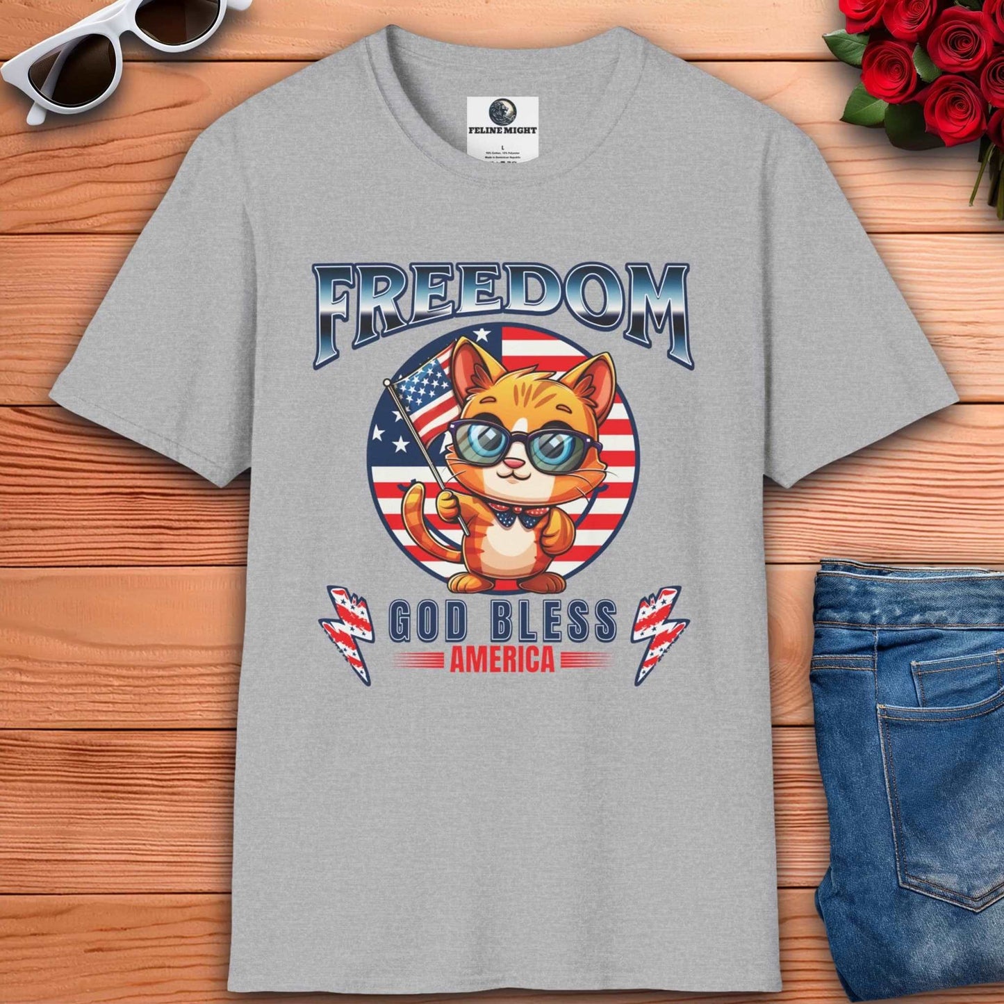 Cute cat wearing glasses on a grey t-shirt with 'Freedom God Bless America' design