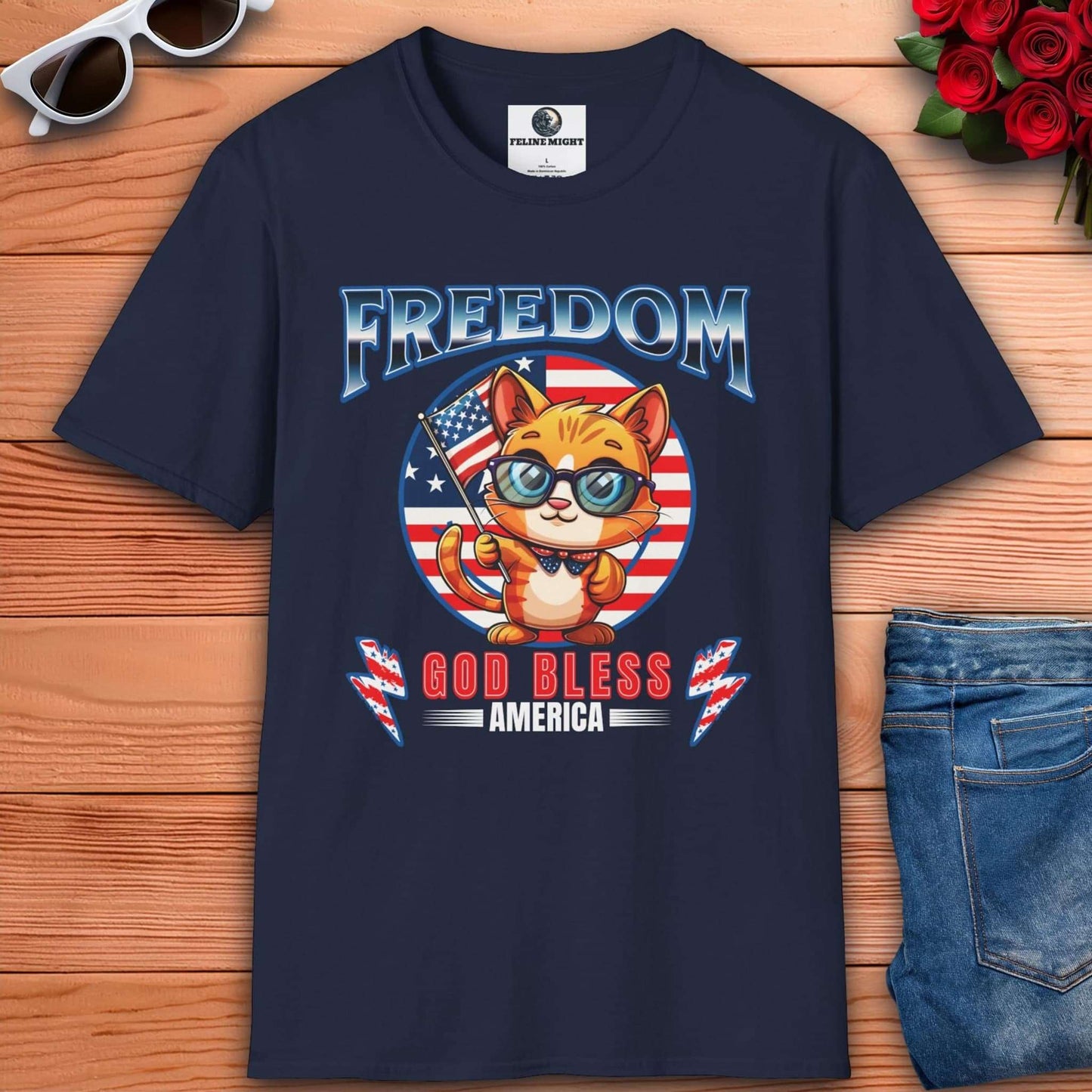 Cute cat wearing glasses on a navy blue t-shirt with 'Freedom God Bless America' design