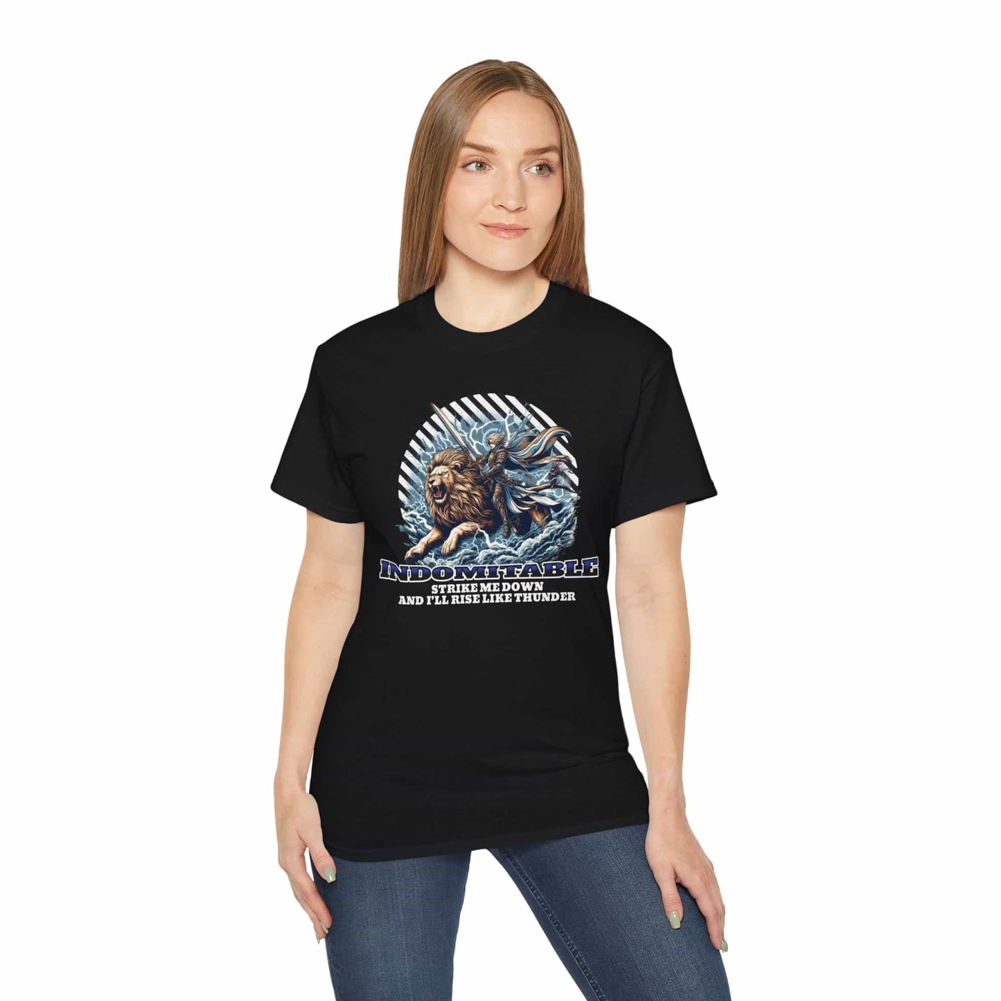 A woman wearing a black Indomitable Warrior Lion T-Shirt featuring a lion and warrior graphic with motivational quote.