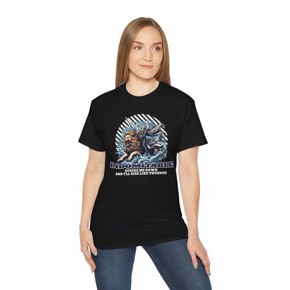 A woman wearing a black Indomitable Warrior Lion T-Shirt featuring a lion and warrior graphic with motivational quote.
