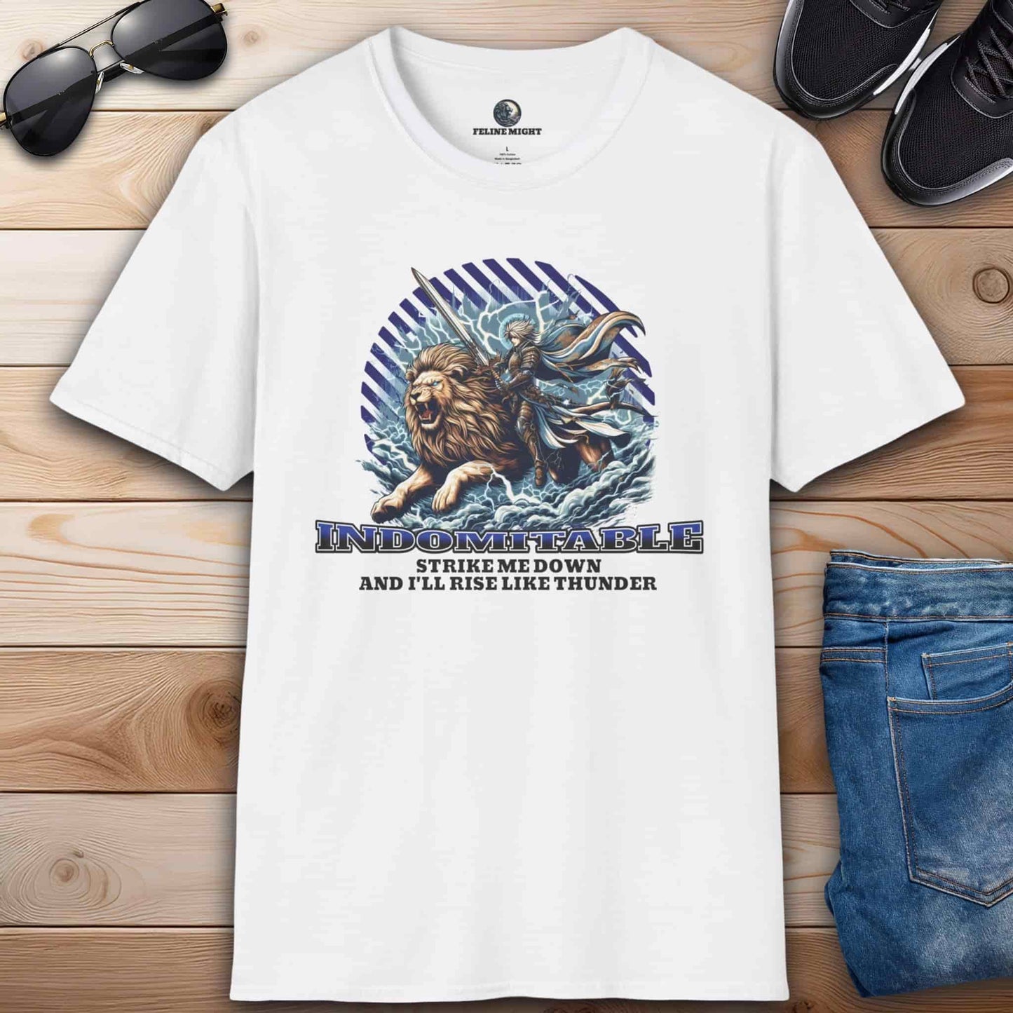 A white Indomitable Warrior Lion T-Shirt featuring a lion, a warrior, and the quote "Strike me down, and I'll rise like thunder" on a premium tee.