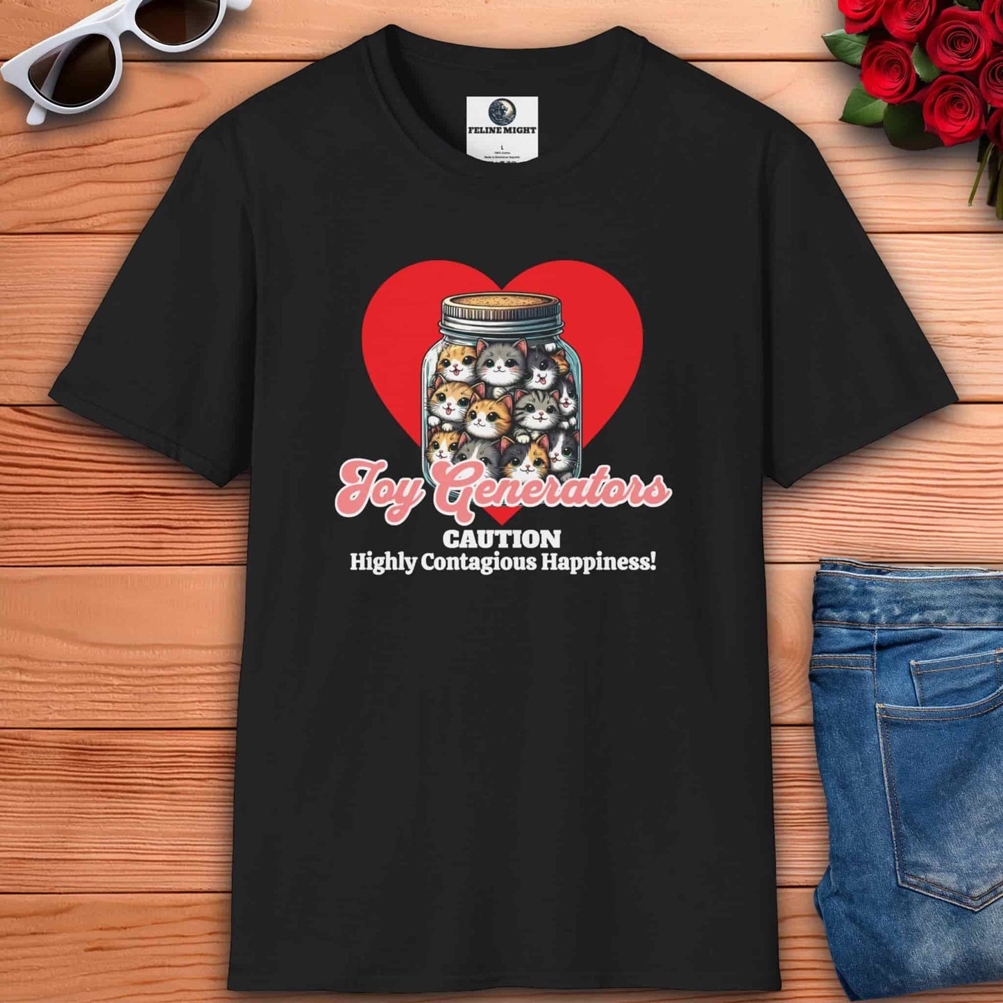 Black t-shirt with a graphic of a jar filled with cute cats and the text 'Joy Generators' and 'Caution Highly Contagious Happiness!'