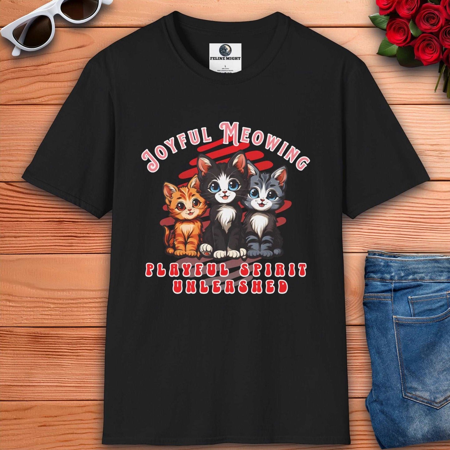 Black t-shirt featuring playful kittens with the text 'Joyful Meowing' and 'Playful Spirit Unleashed'