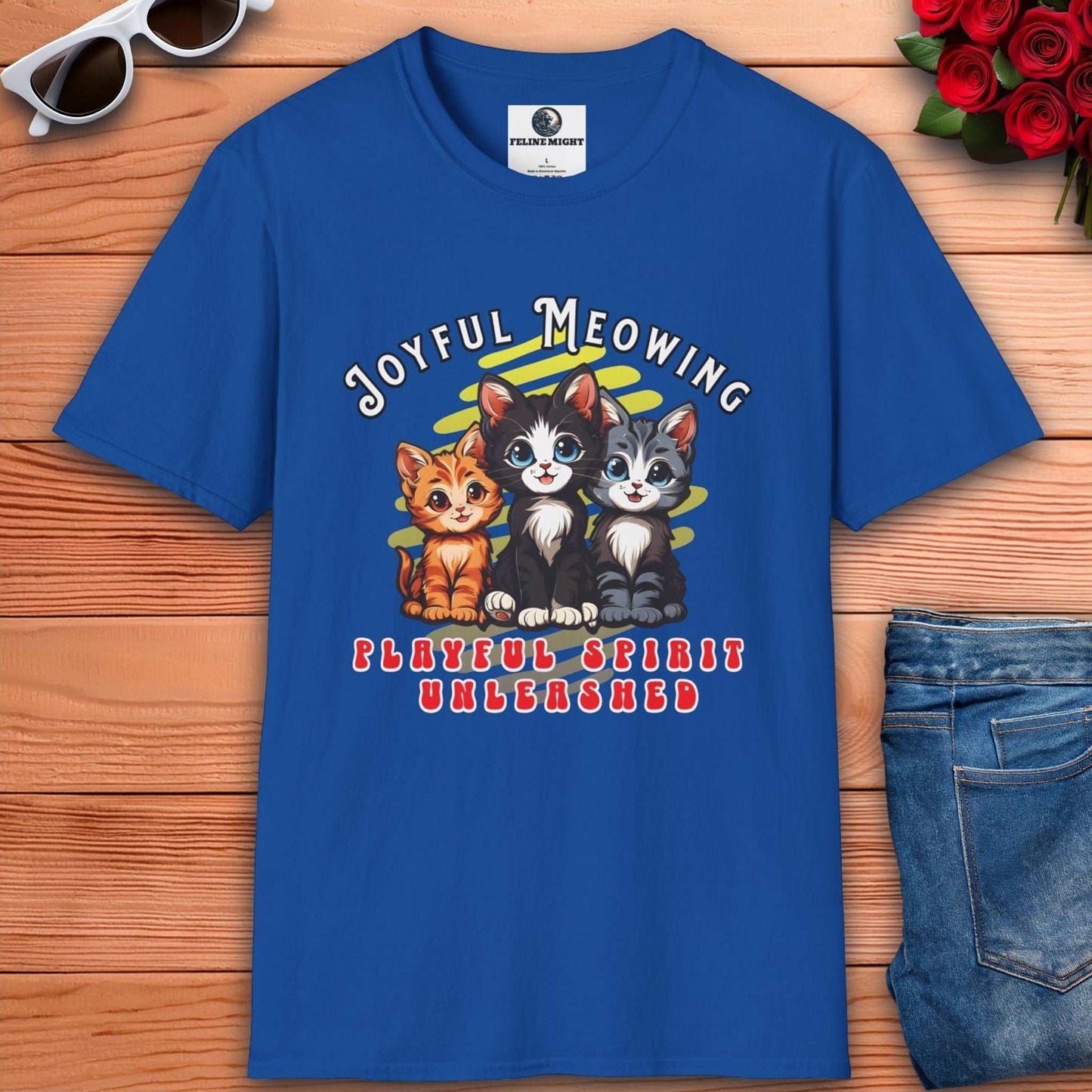 Royal blue t-shirt featuring playful kittens with the text 'Joyful Meowing' and 'Playful Spirit Unleashed'