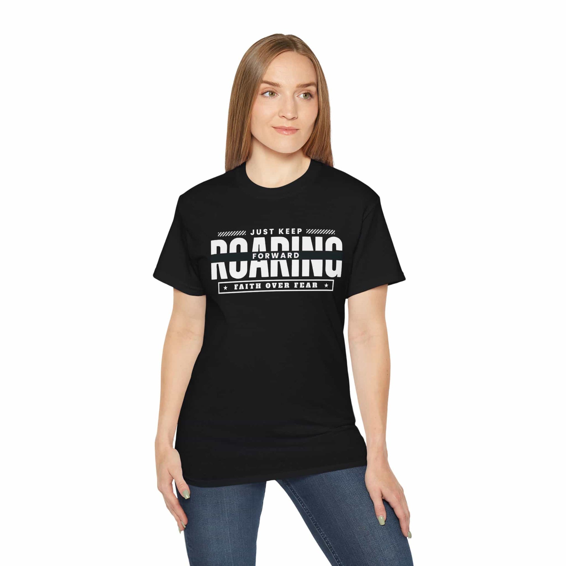 A black Just Keep Roaring Forward T-Shirt worn by a woman, embodying strength and resilience.