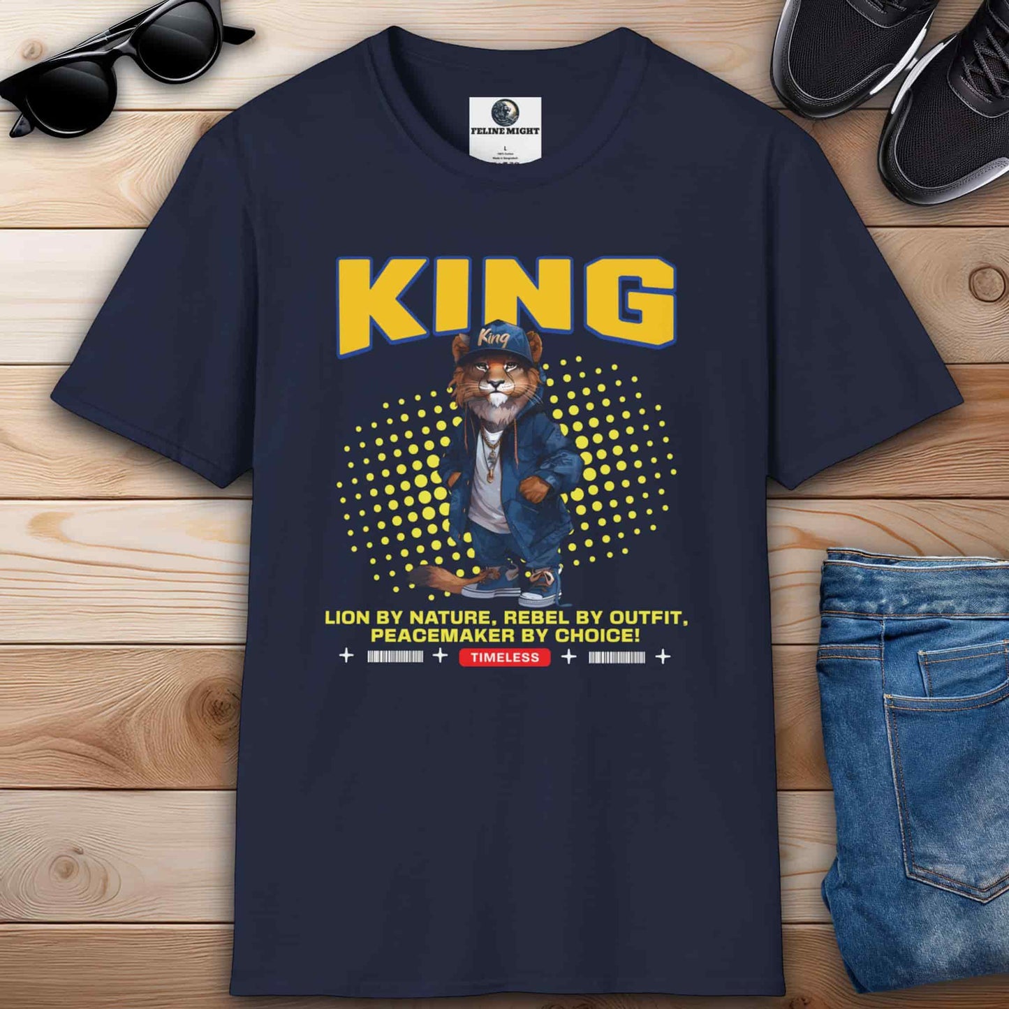 A stylish navy blue King Lion T-Shirt featuring a lion character with the word 'KING' and a catchy slogan.