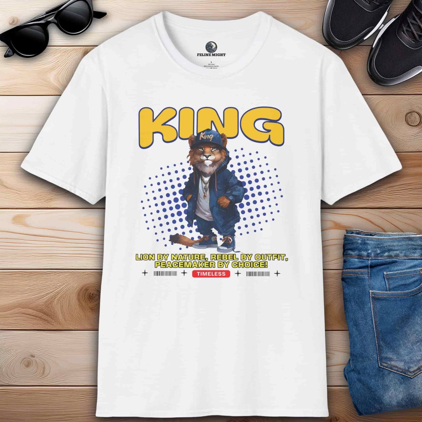 A stylish white t-shirt featuring a lion character with the word 'KING' and a catchy slogan.