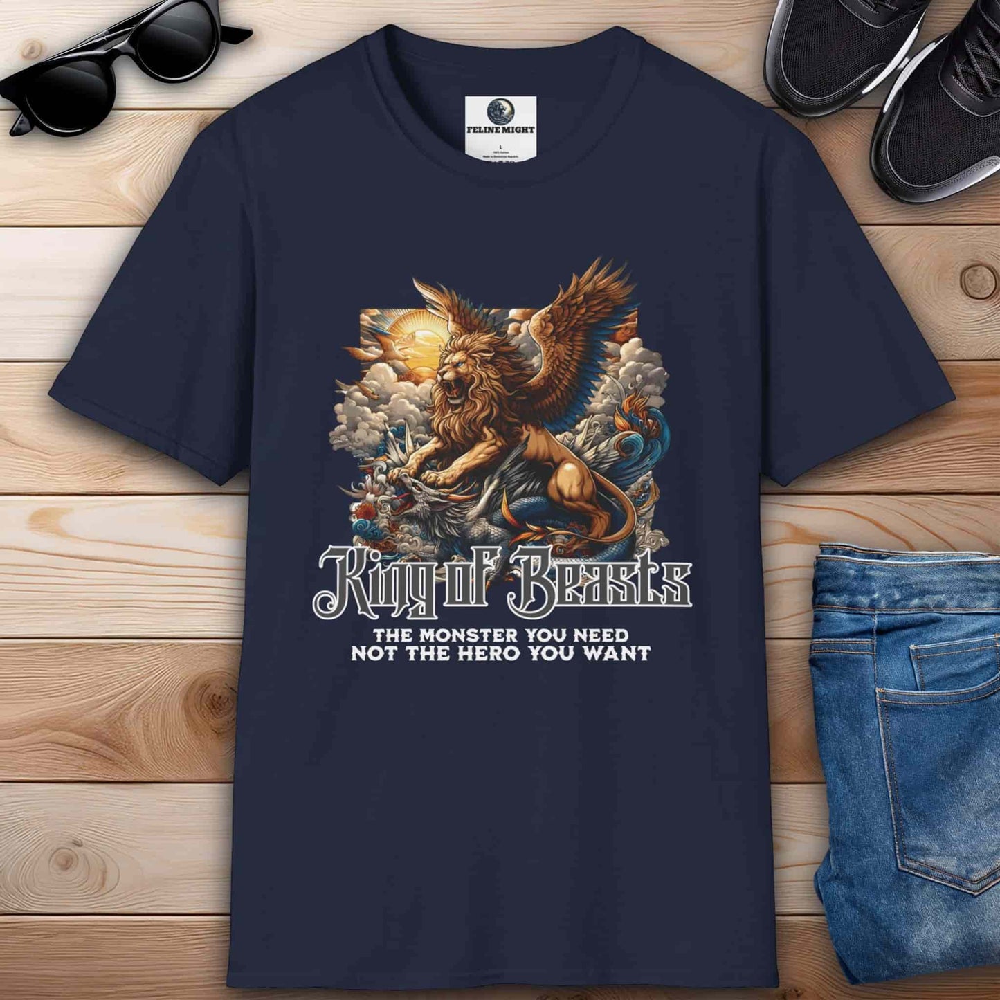 Navy blue t-shirt featuring a winged lion with the text 'King of Beasts: The Monster You Need, Not the Hero You Want.'