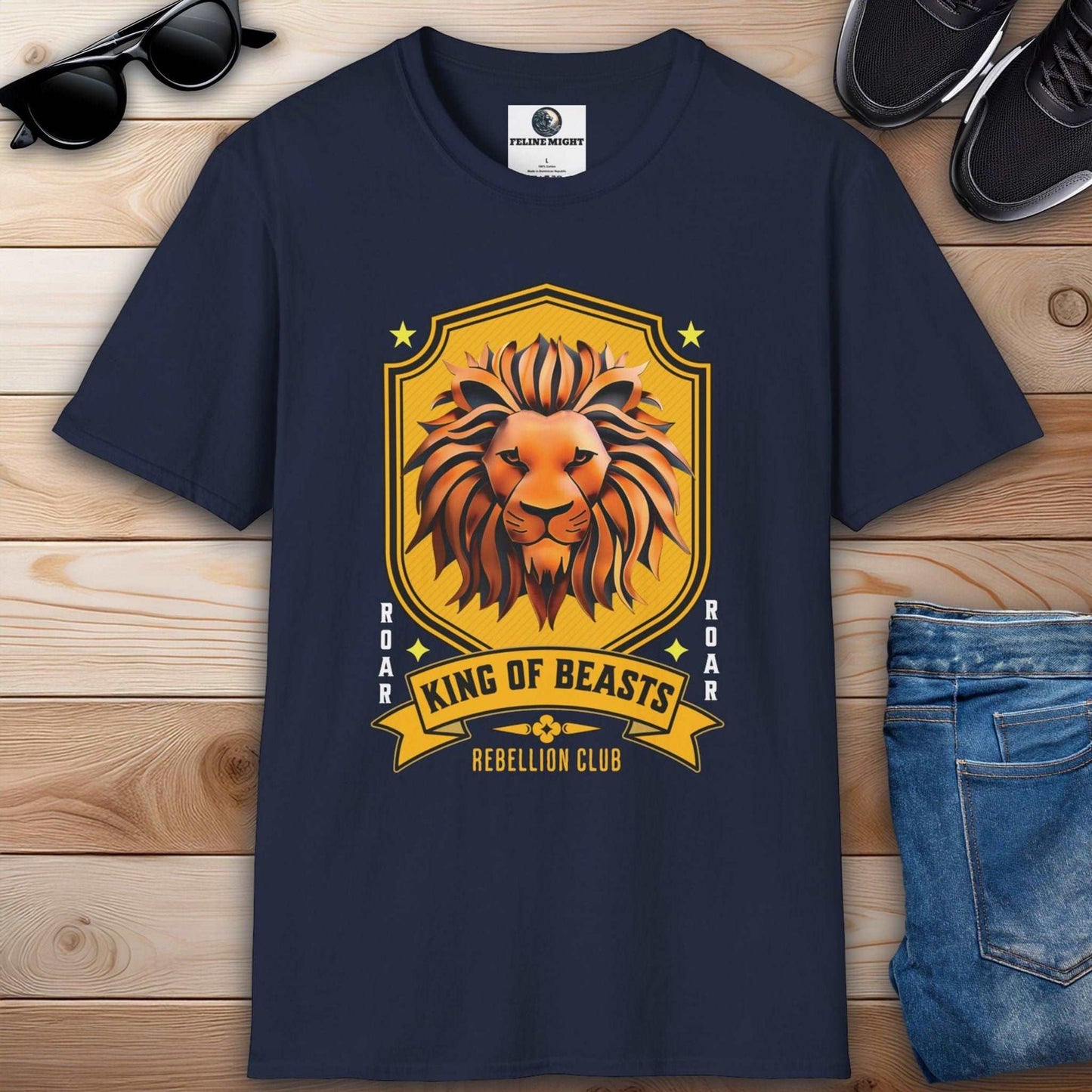 Navy blue T-shirt featuring a lion graphic with the text 'King of Beasts' and 'Rebellion Club'.