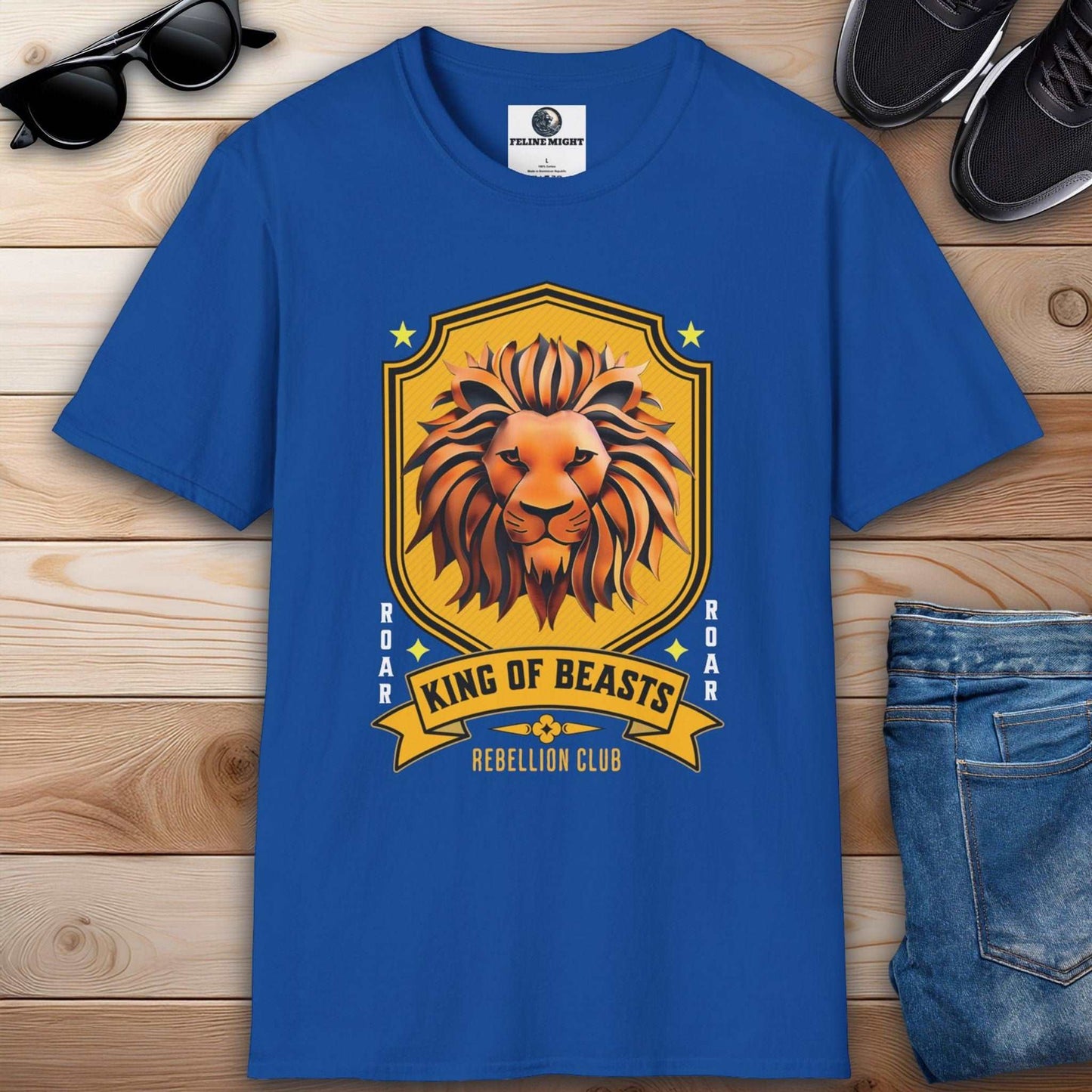 Royal blue T-shirt featuring a lion graphic with the text 'King of Beasts' and 'Rebellion Club'.